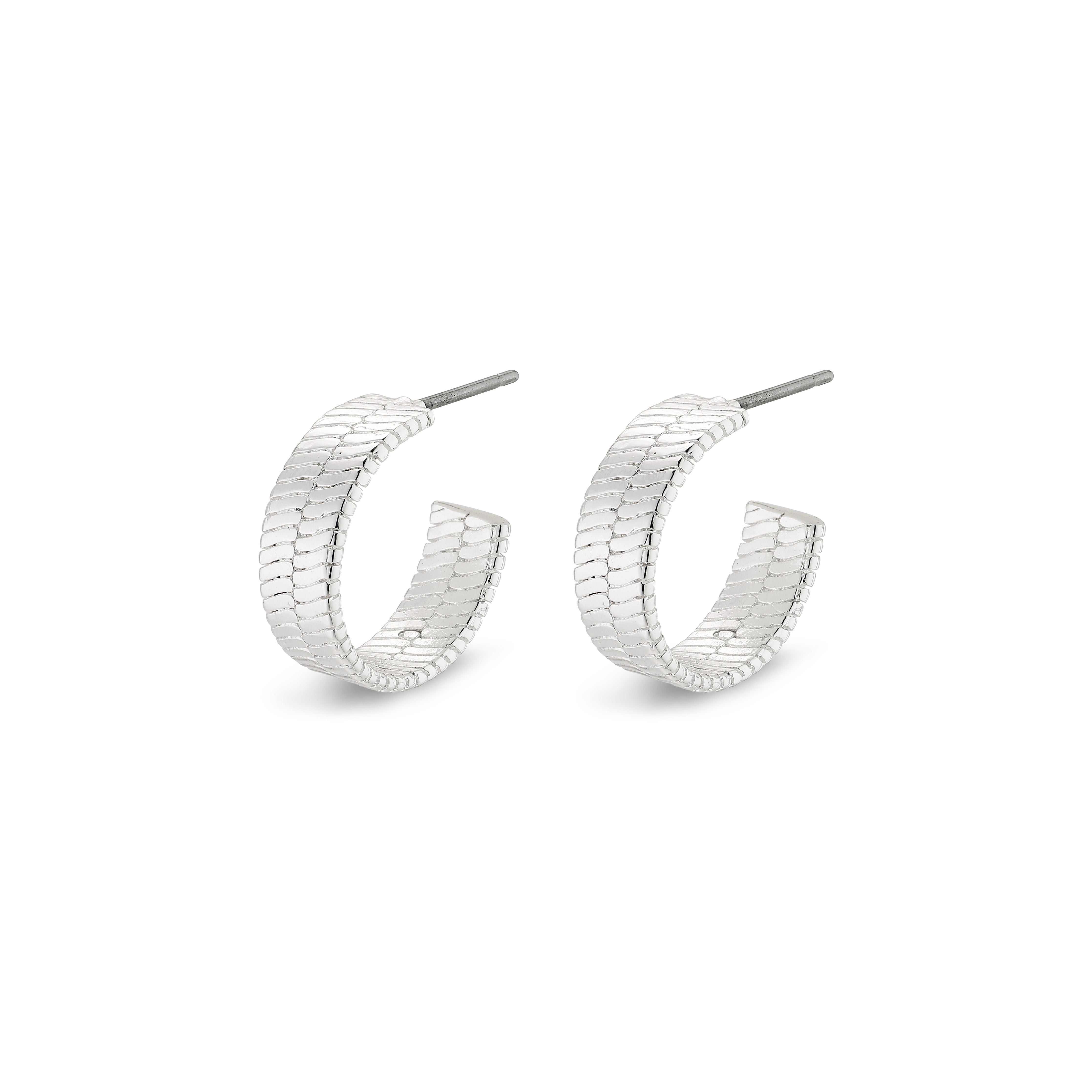 YGGDRASIL earrings silver-plated, featuring wide hoops with embossed patterns inspired by the mythological Yggdrasil tree's leaves, showcasing distinctive Scandinavian design.