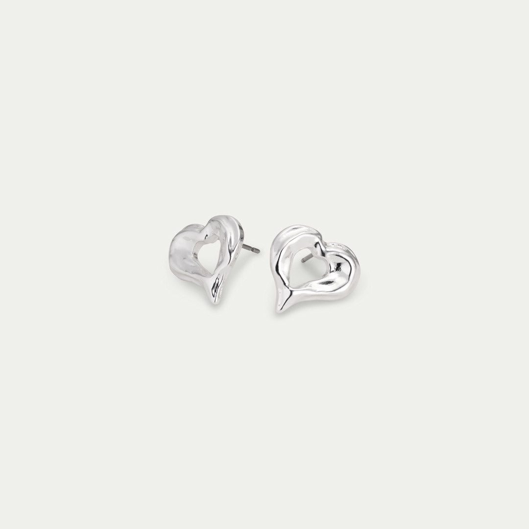 TIDE heart earrings, silver-plated, beautifully crafted from recycled materials, feature an elegant heart shape, adding romance and shine to any outfit.