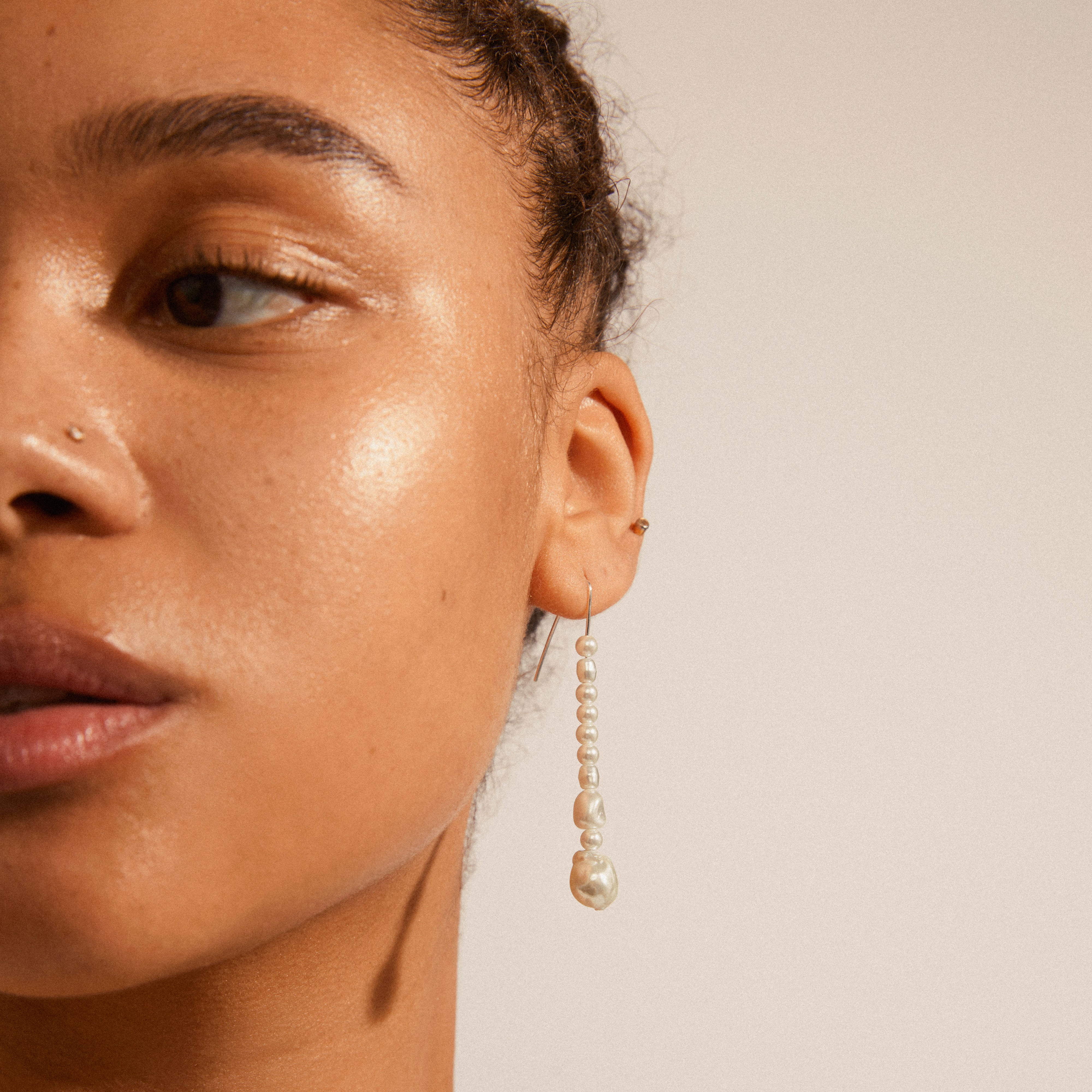 WILLPOWER pearl earrings silver-plated, featuring asymmetrical imitation pearls for an organic, modern twist on classic design, inspired by nature's beauty.