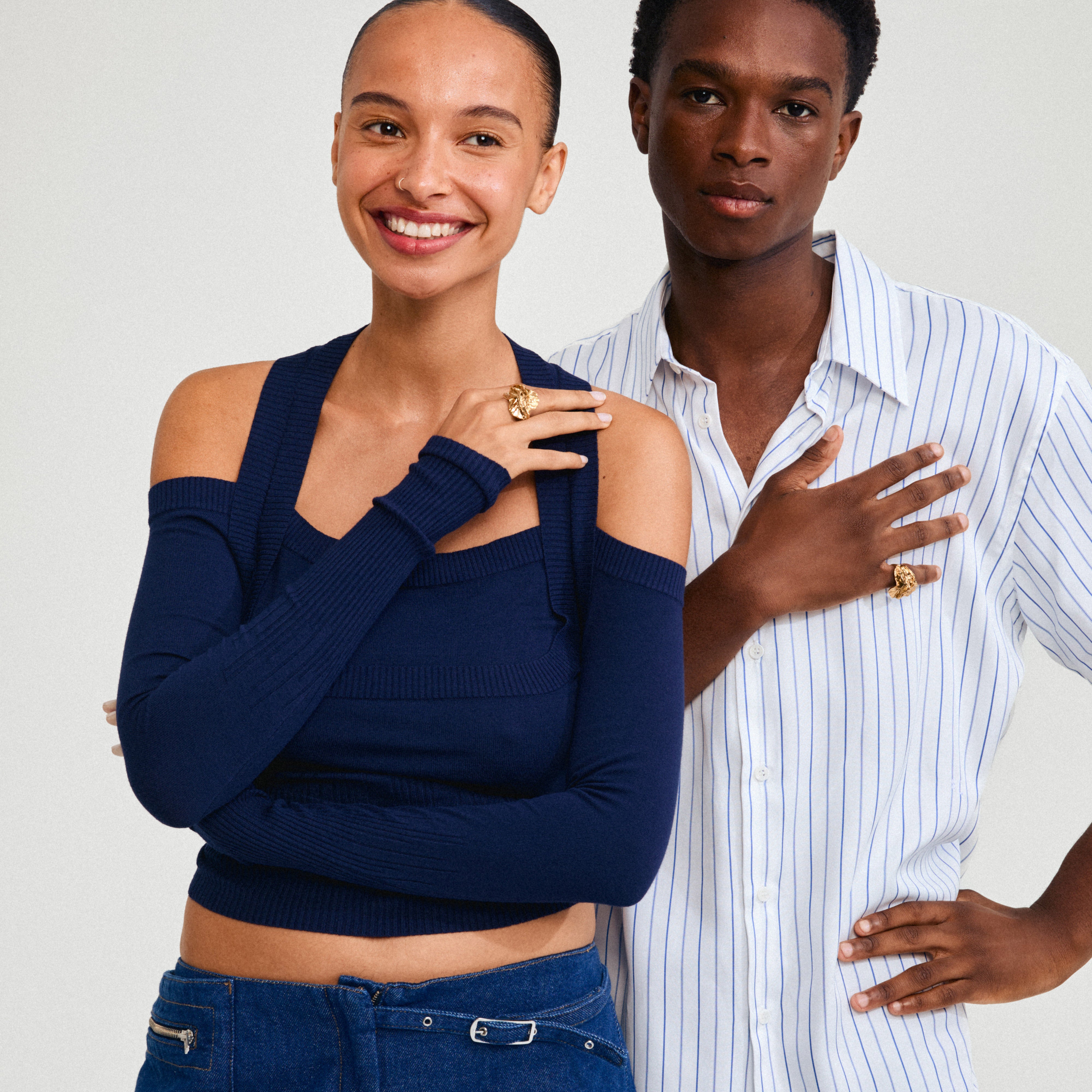ECLIPSE ring gold-plated on a man's finger, showcasing its bold, organic design and shiny finish, embodying empowerment and nature's connection.