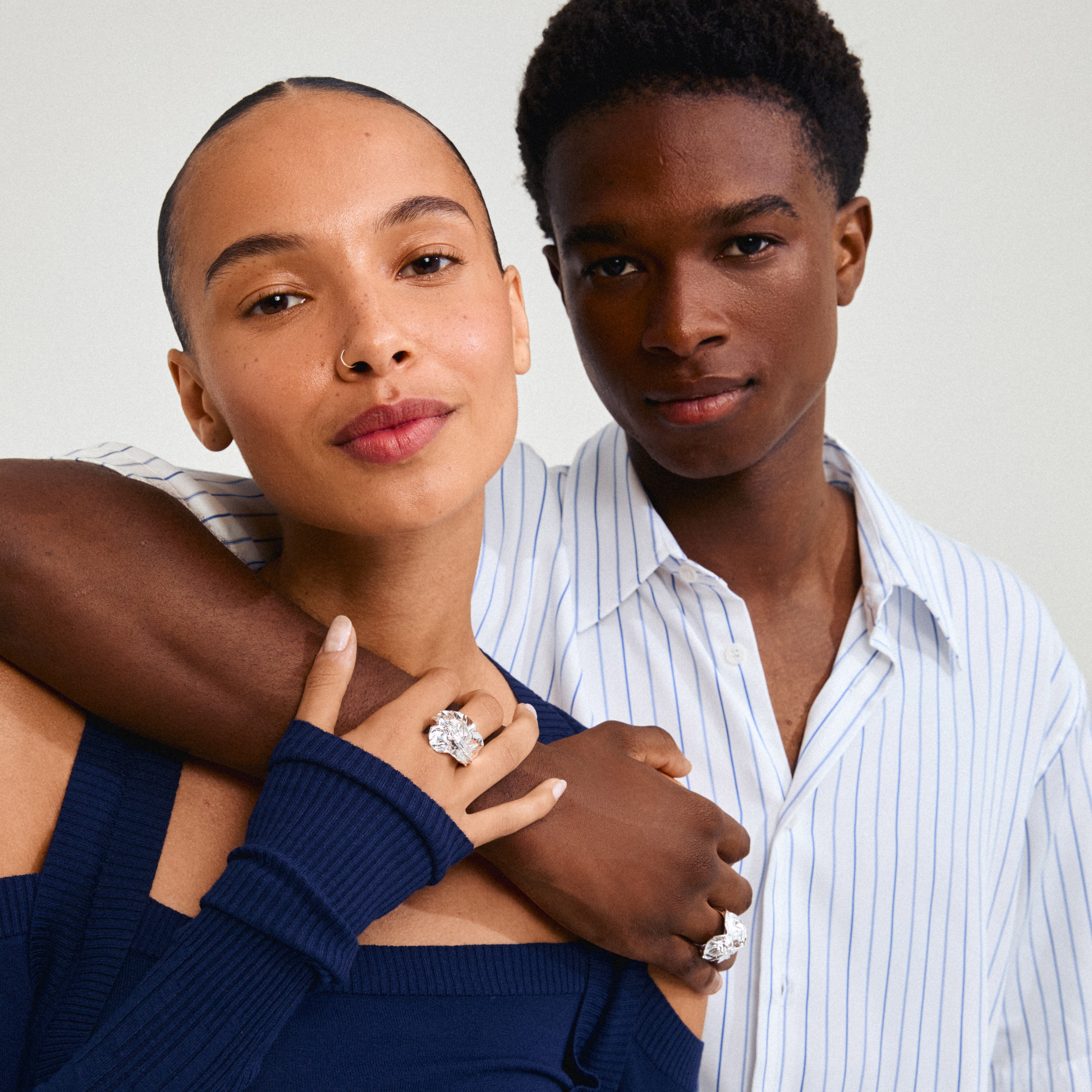 ECLIPSE ring silver-plated, showcased in a stylish close-up, features bold, organic shapes and shiny finish, emphasizing empowerment and connection to nature.