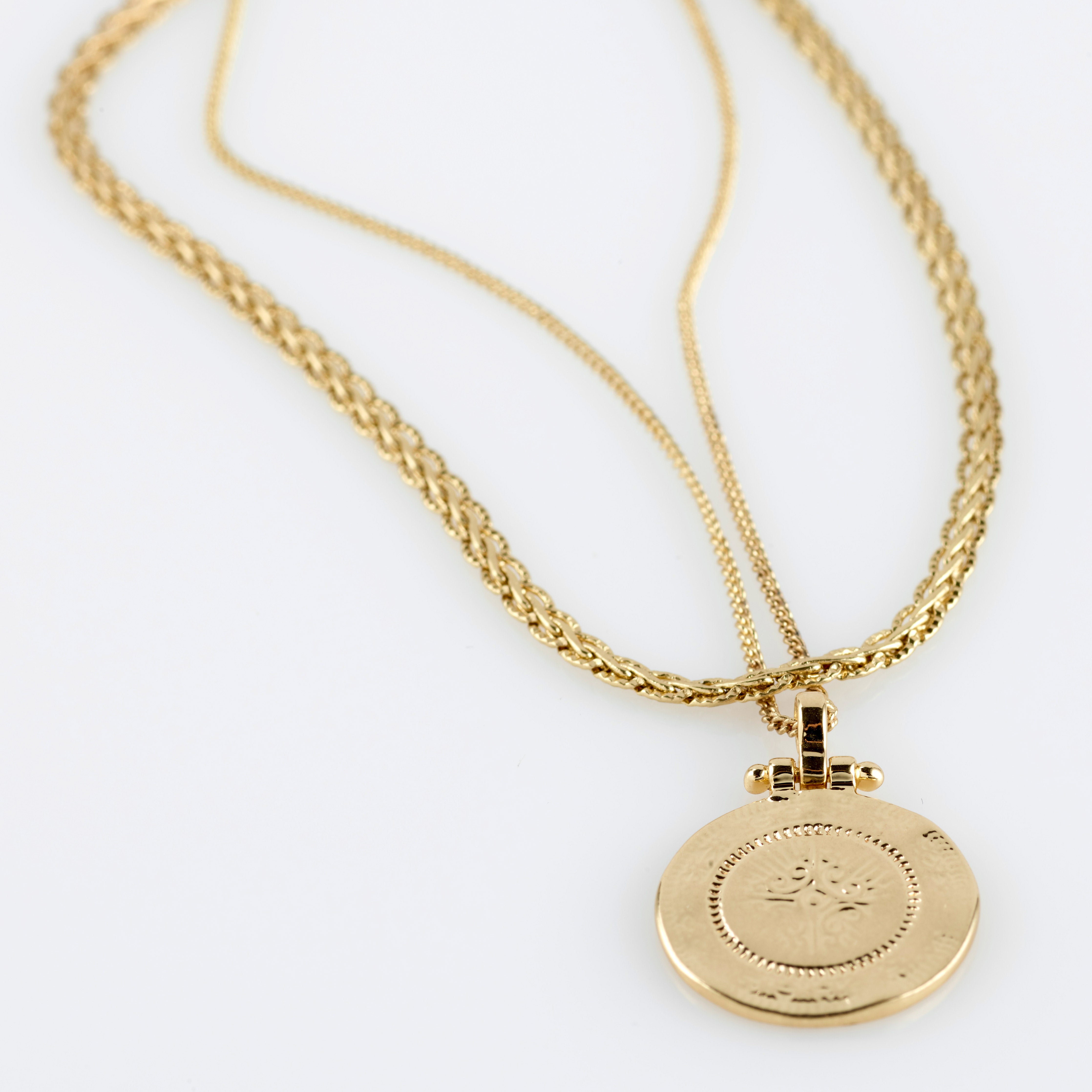 NOMAD 2-in-1 coin necklace, gold-plated, featuring two separate chains with a layered coin pendant design for a trendy, versatile look.