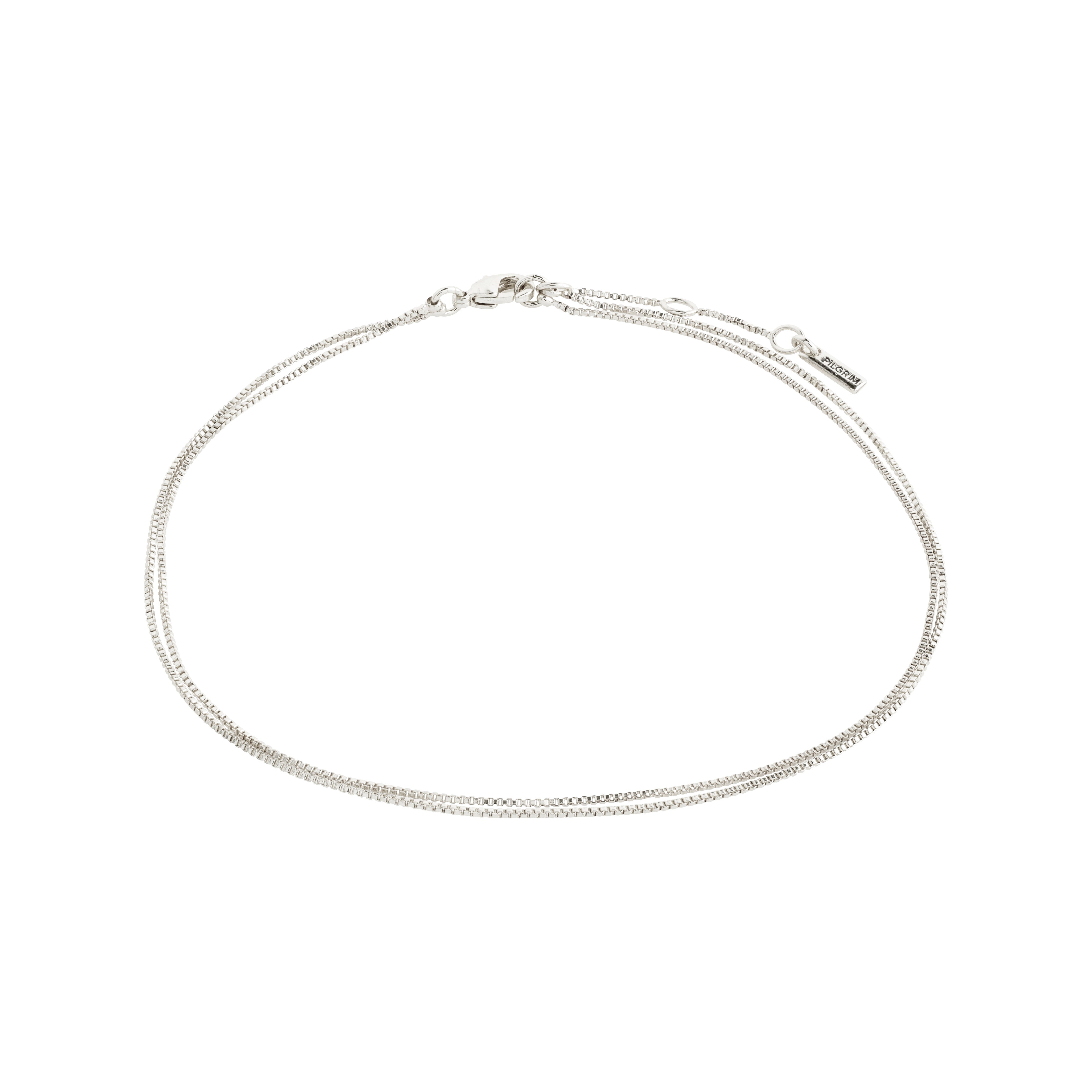 Silver-plated 2-in-1 CARE ankle chain with two slender box chains, perfect for enhancing summer styles with sandals or sneakers. Made from 99% recycled materials.