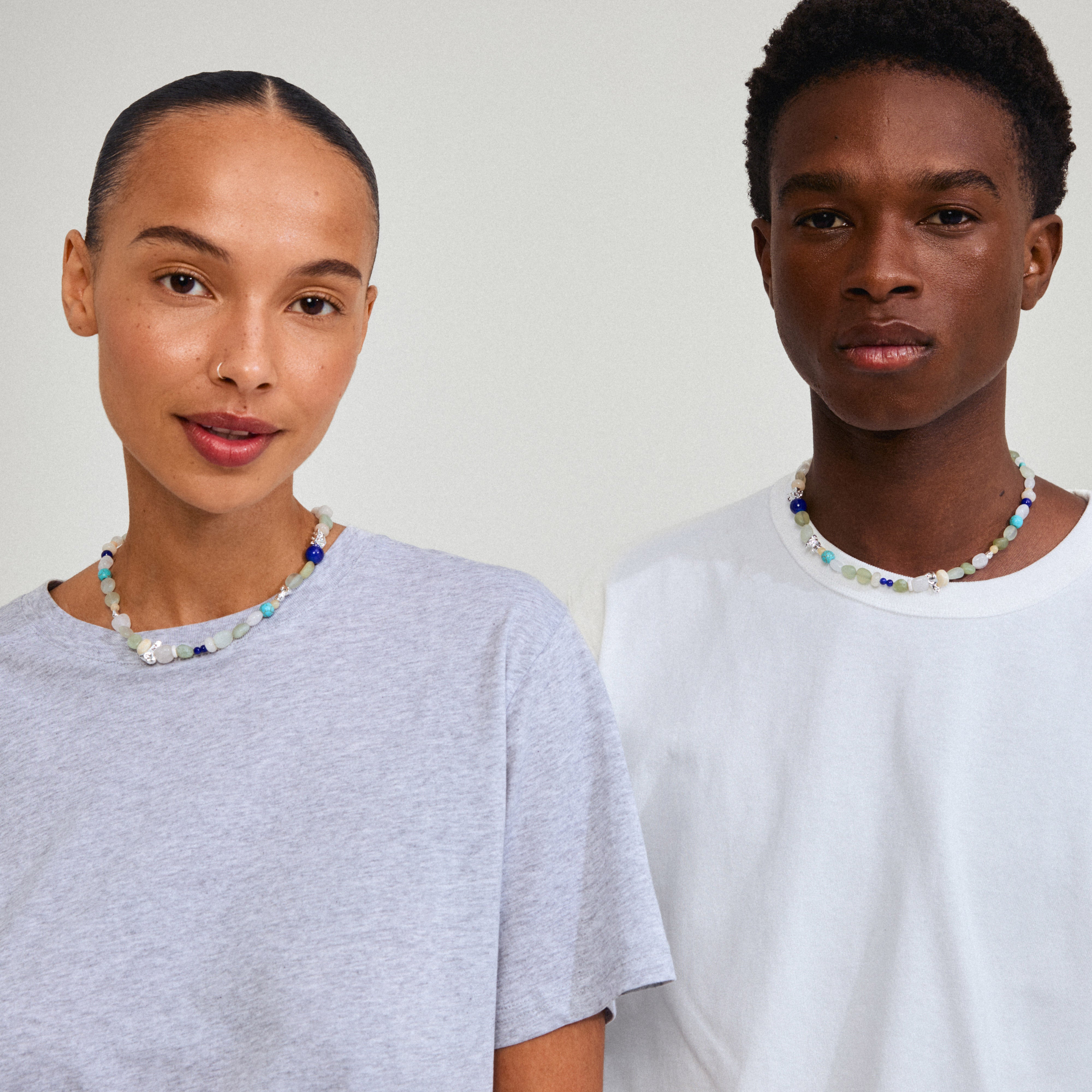 DREAM necklace blue/silver-plated featuring semi-precious stones on a woman, showcasing a blend of summer-inspired elegance and Scandinavian craftsmanship.