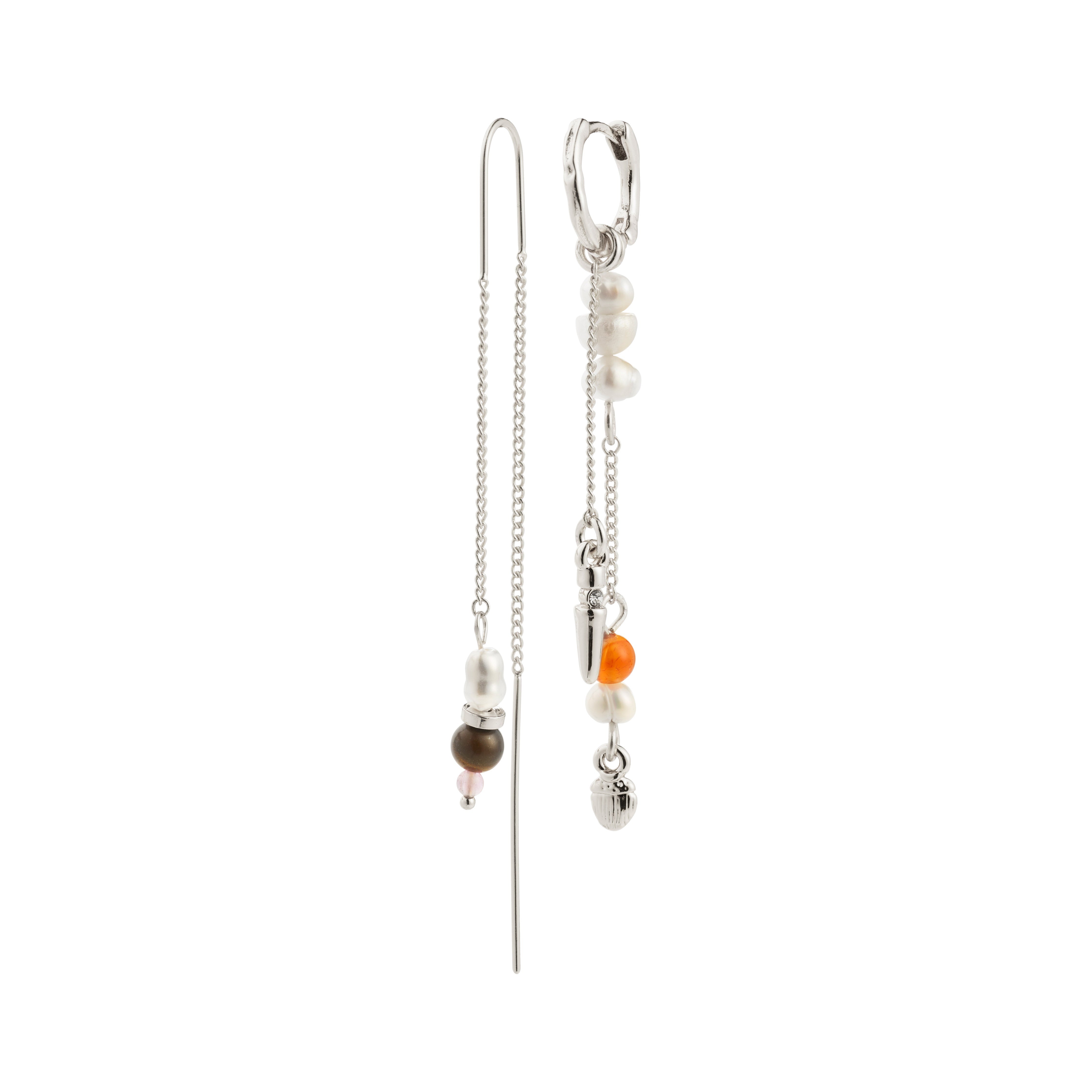 Close-up of Pilgrim's BETWEEN silver-plated chain earrings, featuring asymmetrical hoop and chain design with amethyst, aventurine, tiger eye, and freshwater pearl pendants.