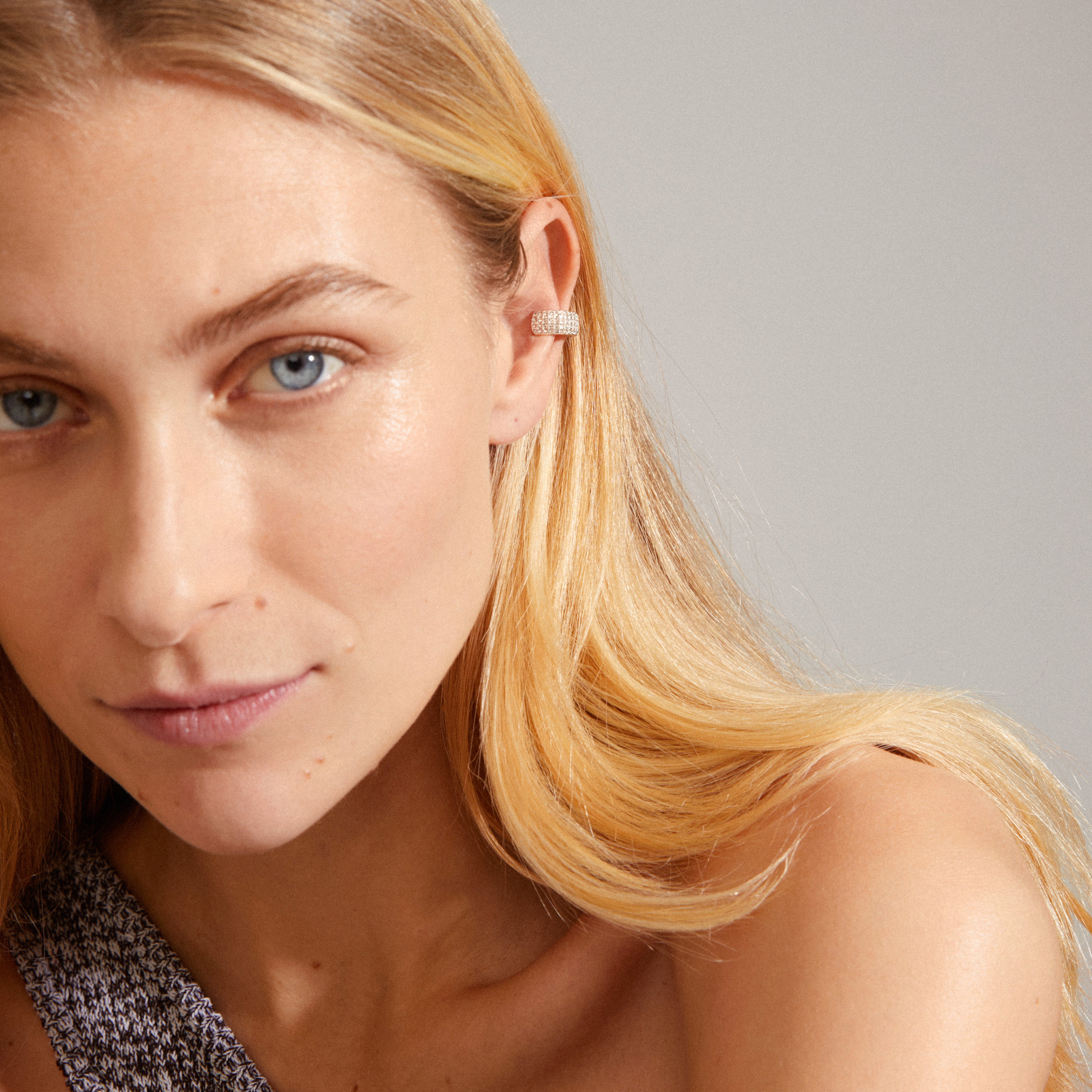 MATYLDA silver-plated ear cuff adorned with sparkling Preciosa crystals, showcasing a chunky, shiny surface for a stylish, timeless look. Ideal for stacking with other earrings.