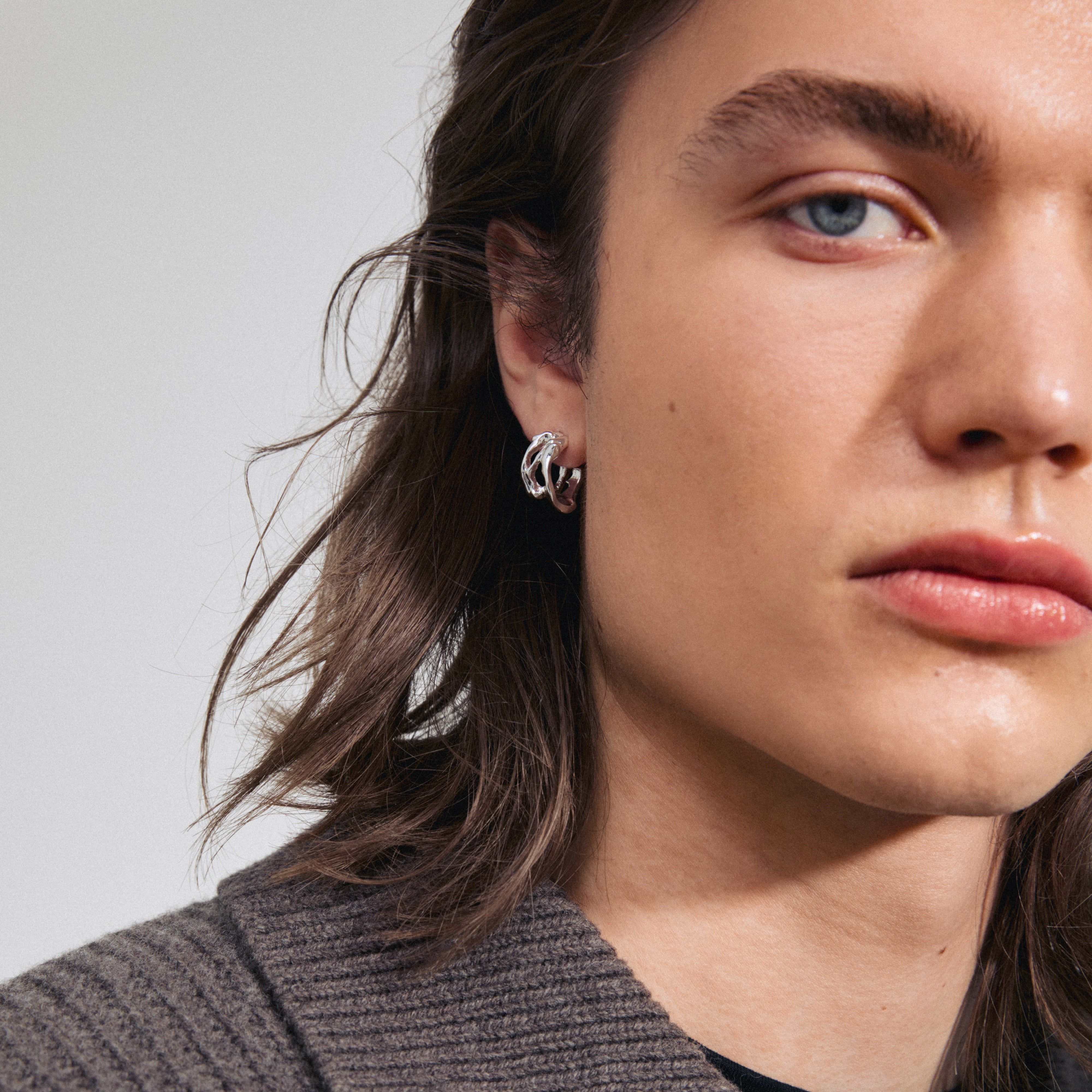 FOTINI silver-plated hoop earrings, close-up of organic design, showcasing lightweight elegance and craftsmanship, perfect for everyday style.