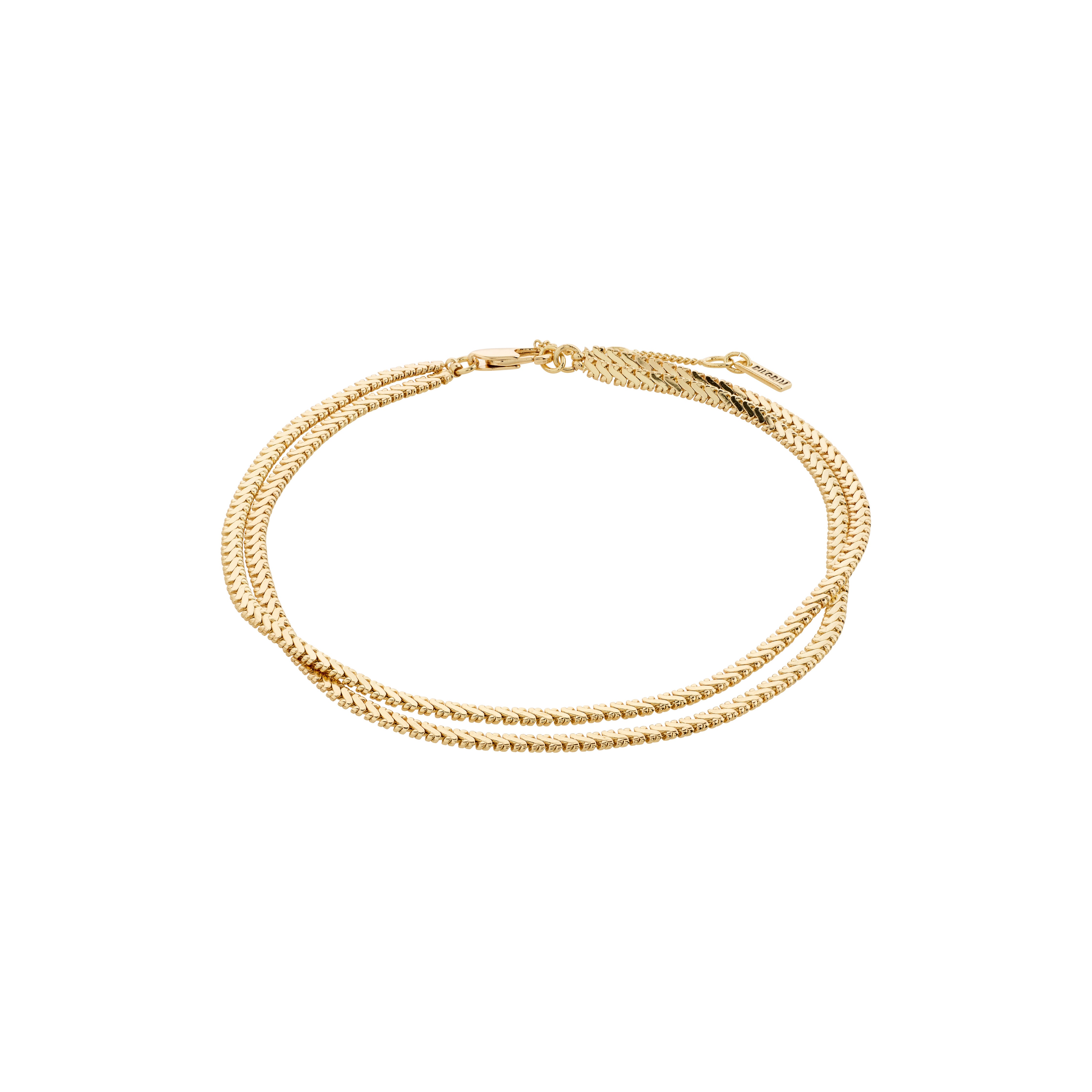 JELONA ankle chain gold-plated, featuring two layered flat snake chains, offering a chic and stylish look perfect for complementing sun-kissed summer outfits.