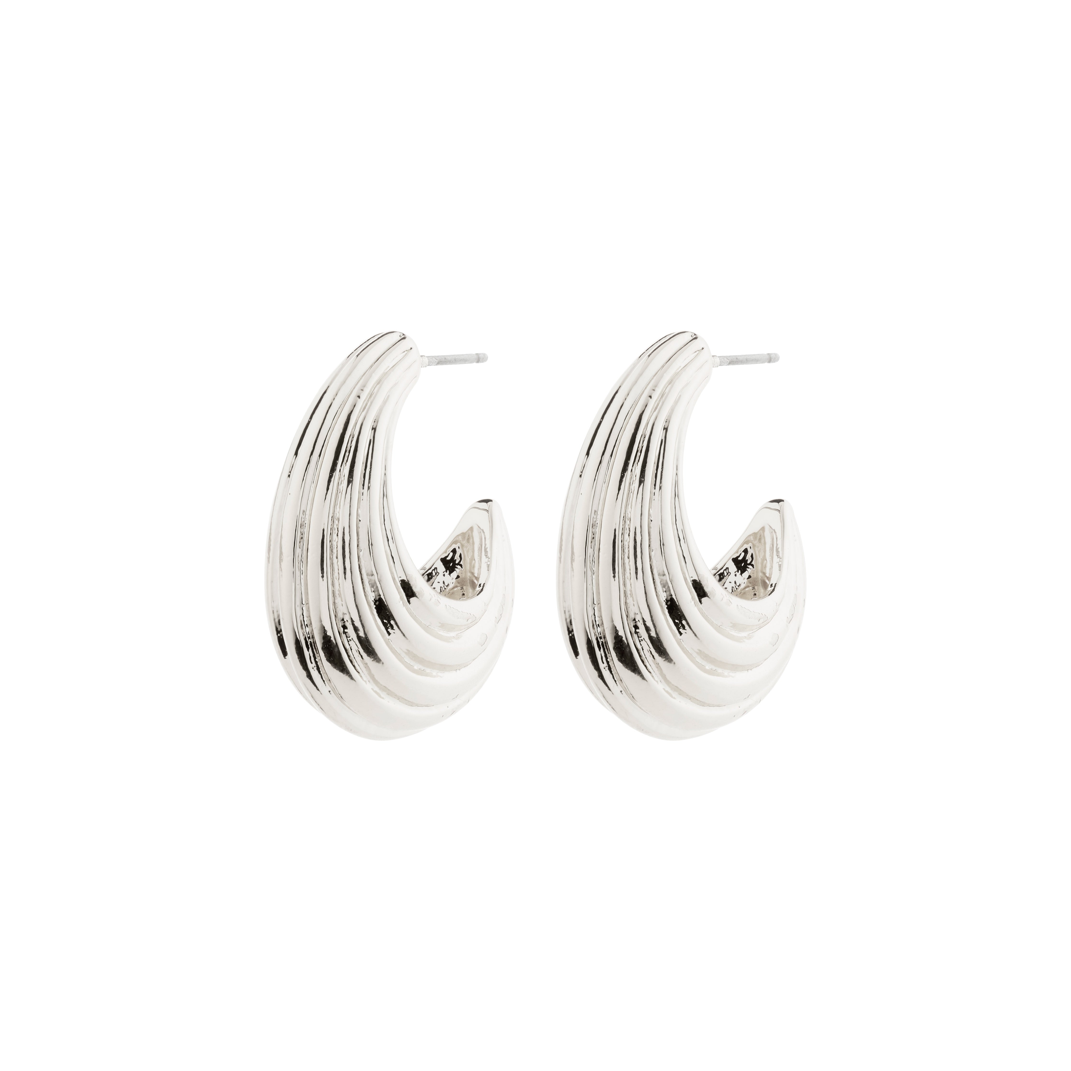 ASLE earrings: Silver-plated, chunky half hoops with fluted texture, inspired by ocean waves and sand dunes, embodying Pilgrim's Scandinavian craftsmanship.