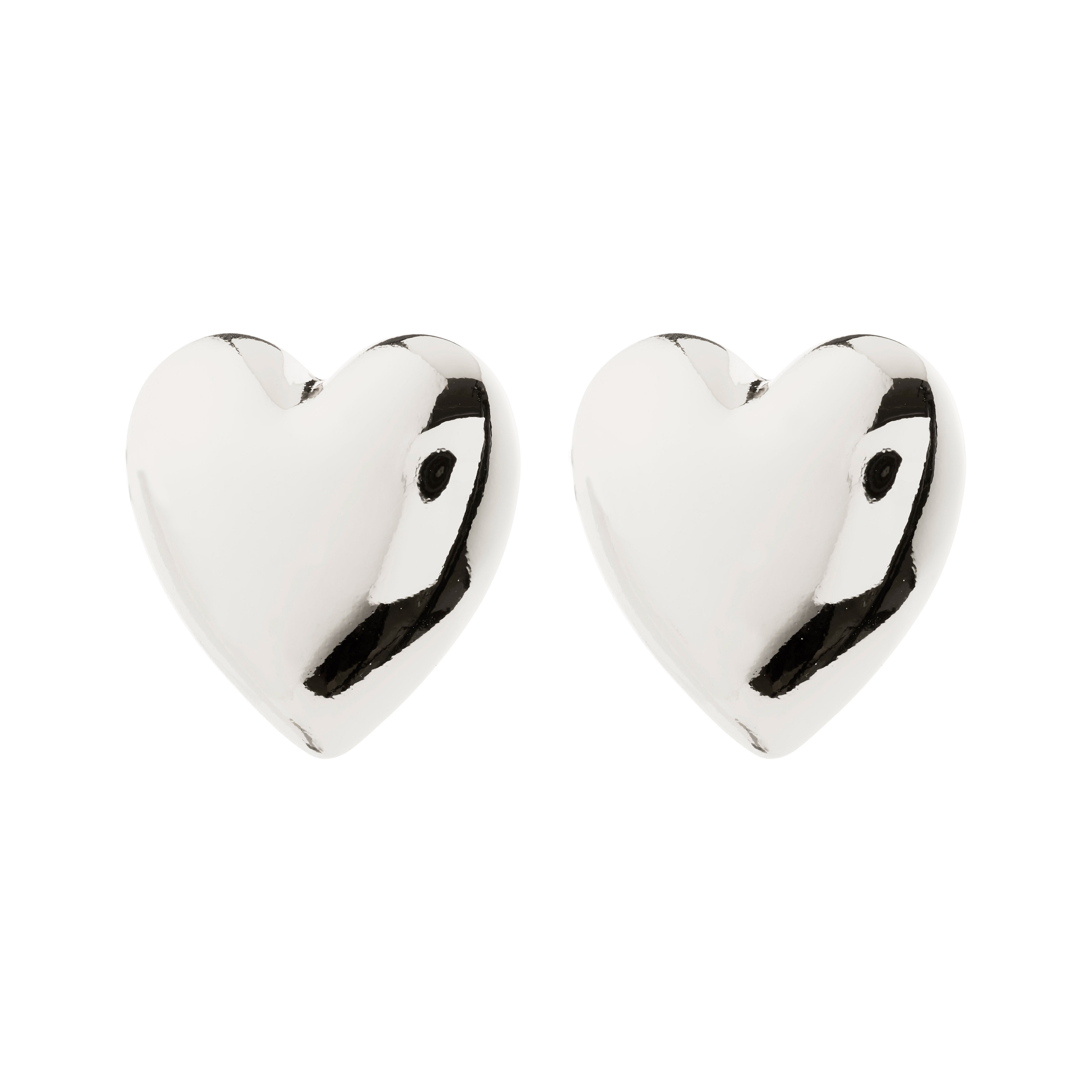Silver-plated ANNEMETTE earrings: chunky, shiny heart-shaped design, perfect for adding edgy romance and glamour. Crafted from 99% recycled materials by Pilgrim.