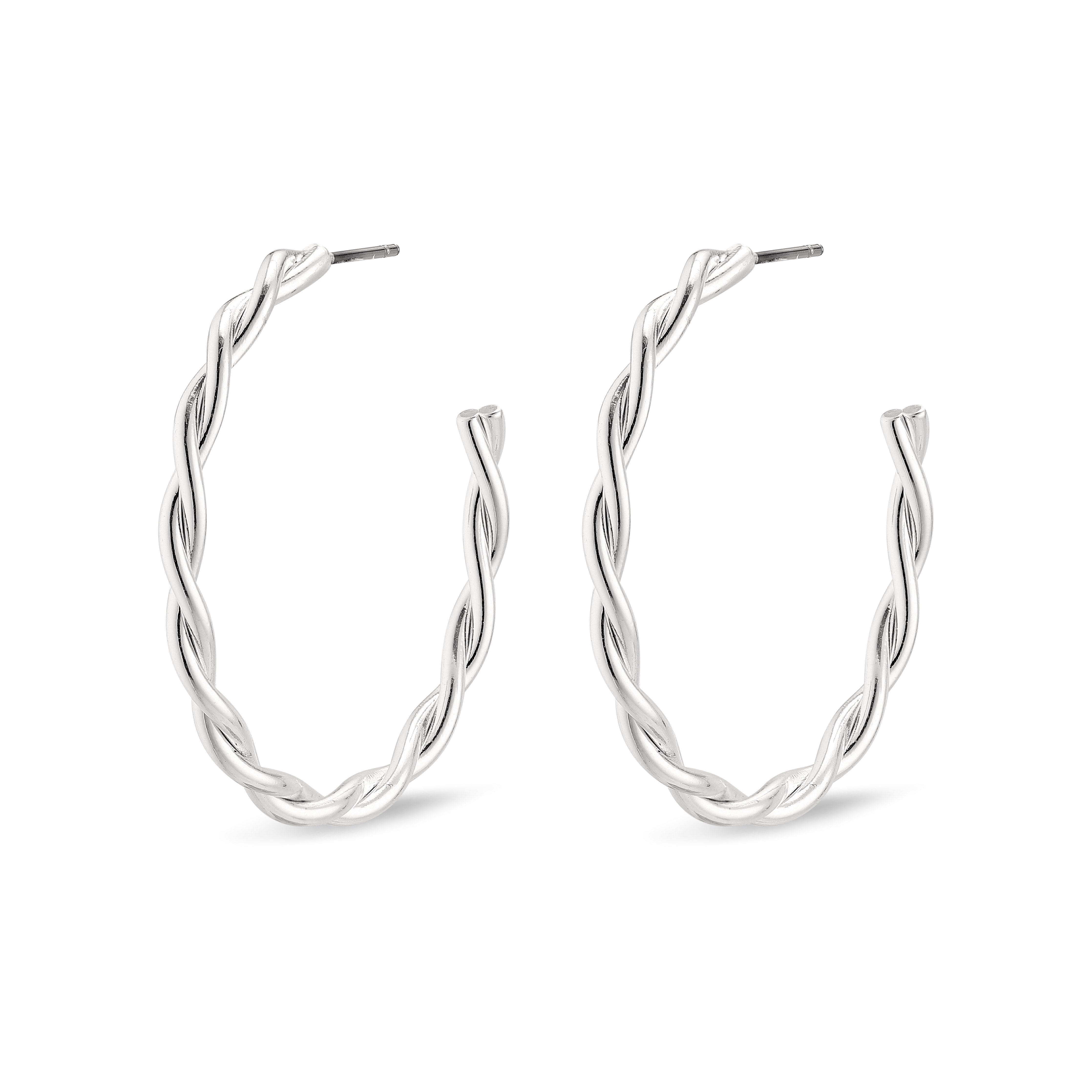 Silver-plated NAJA large hoop earrings with a twisted design, reflecting light beautifully. Medium-sized and chic, perfect for enhancing personal style.