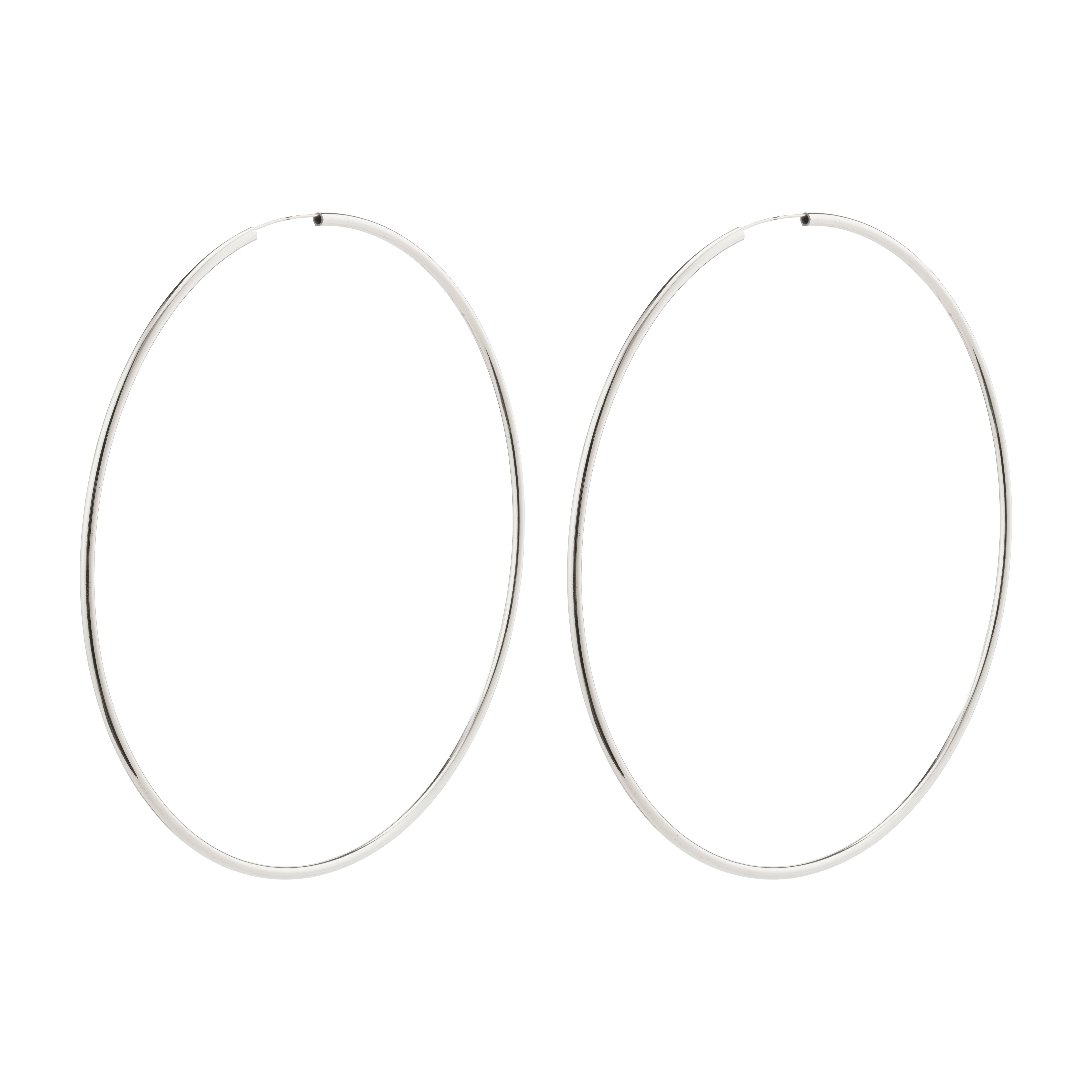 APRIL mega hoop earrings, silver-plated, with a 100mm diameter, featuring a slim, elegant silhouette for versatile styling. Made from 99% recycled material.