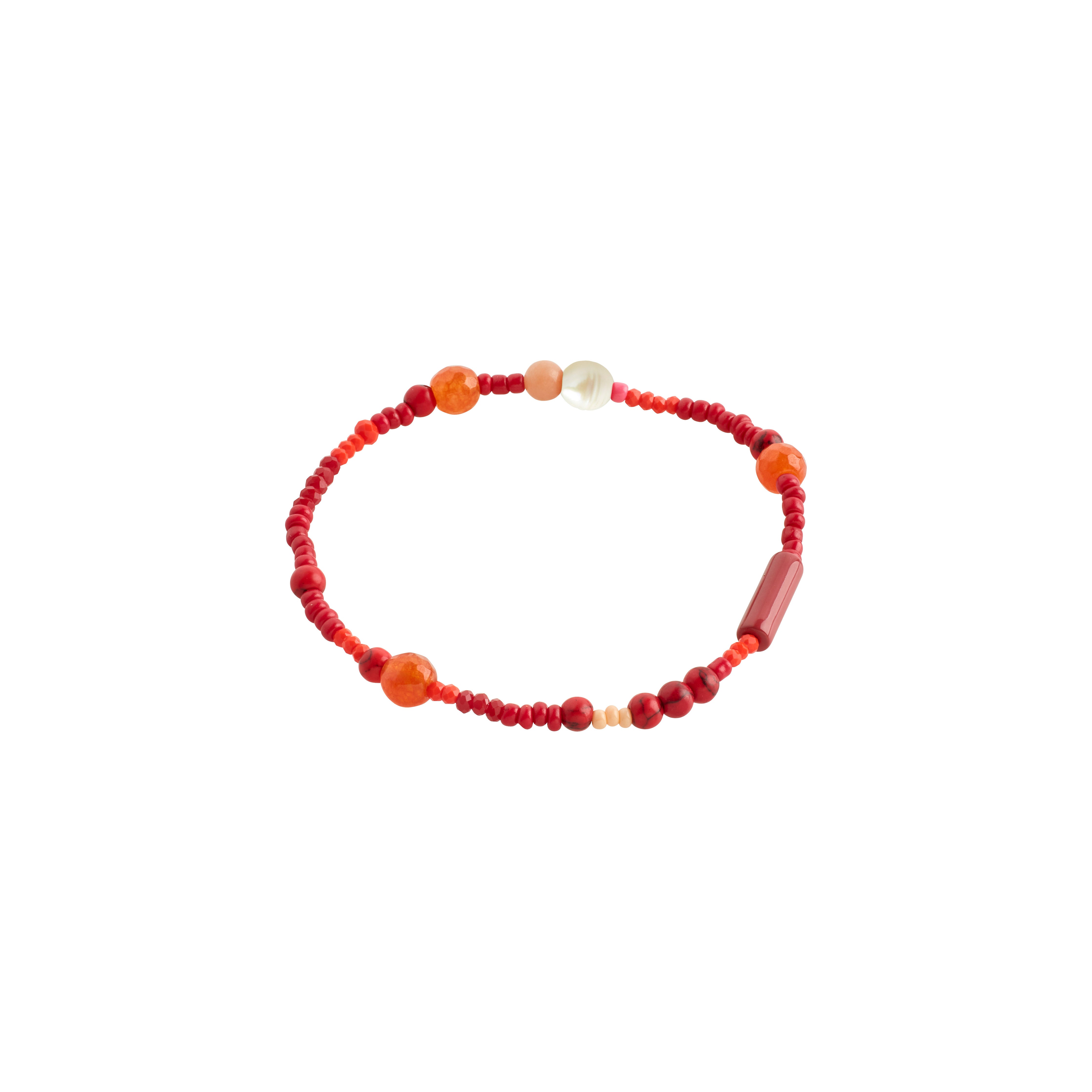 INDIANA bracelet red featuring red agate and freshwater pearls with faceted glass beads on Lycra elastic, offering an organic, stylish look for versatile stacking.
