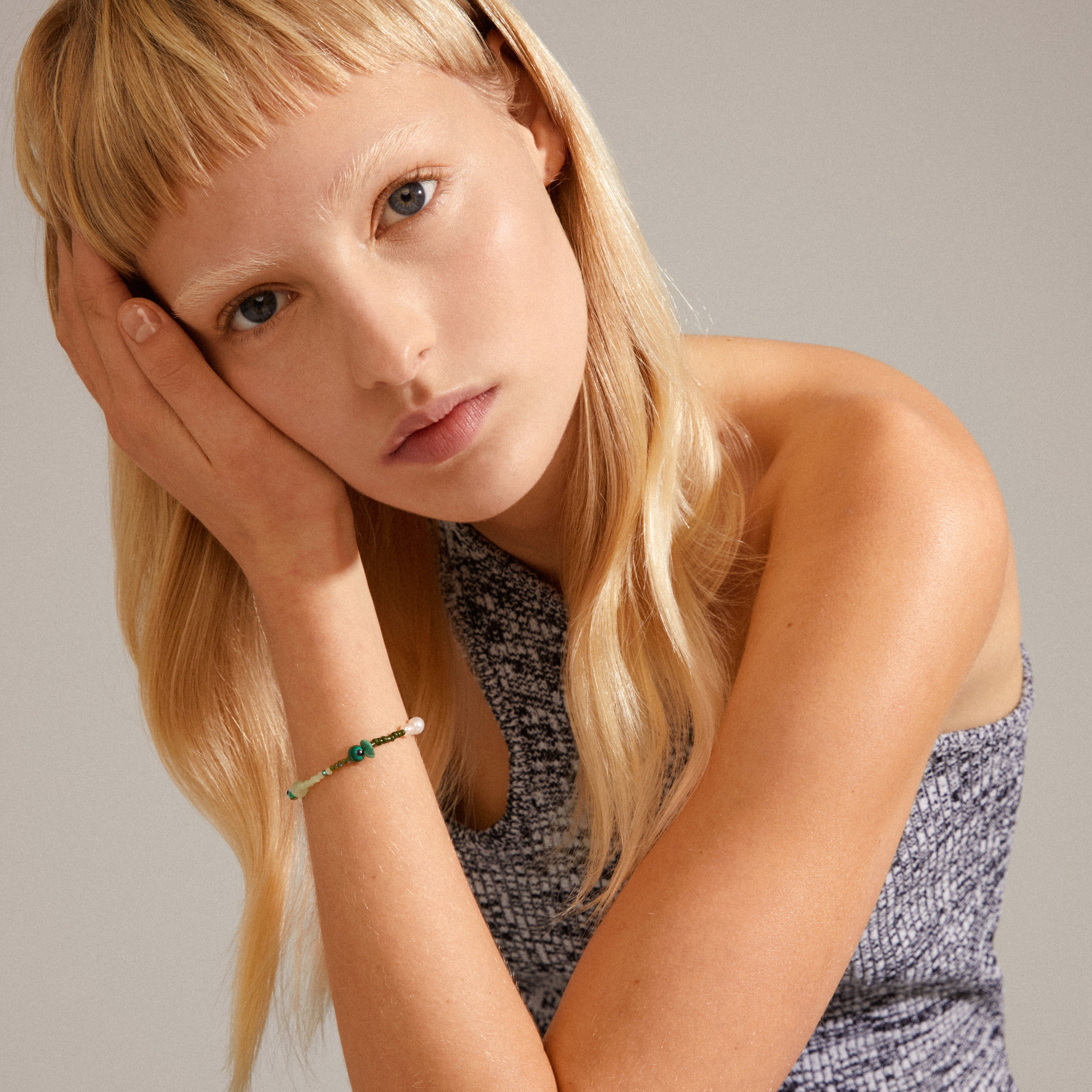 INDIANA bracelet green featuring genuine freshwater pearls, semi-precious green jade, and green glass beads, perfect for a stylish, stacked look.