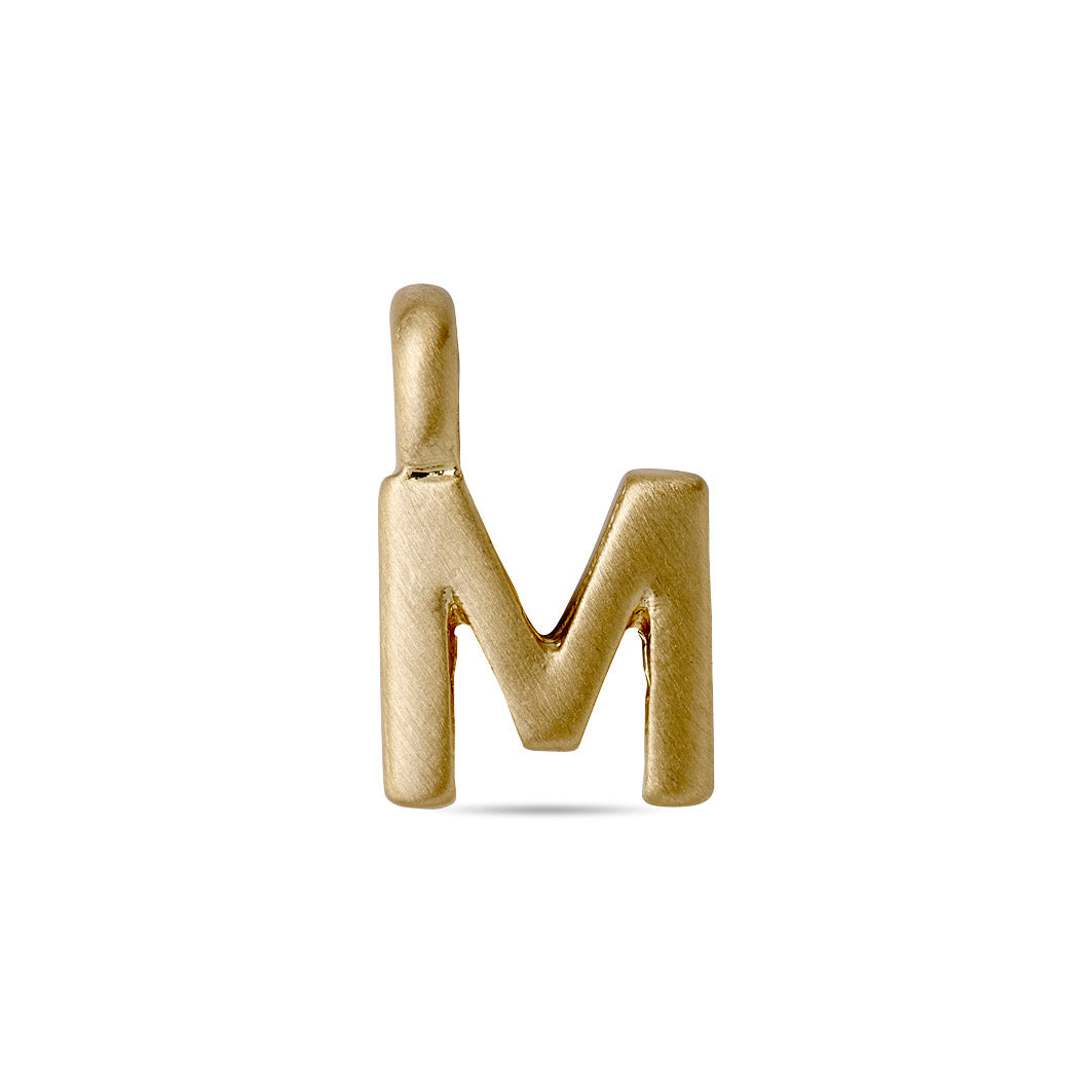 Gold-plated CHARM M pendant on white background, ideal for personalized jewelry. Perfect for layering or wearing solo, adds bespoke touch to any collection.