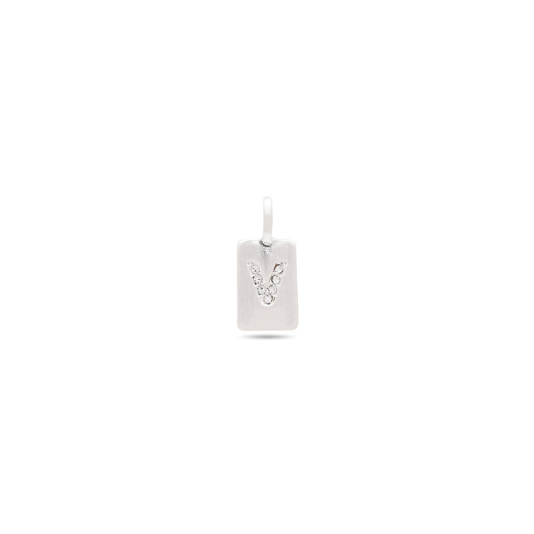 Silver-plated CHARM crystal V pendant with sparkling stones on a satin matt surface, ideal for bracelets or necklaces, symbolizing love and personal style.
