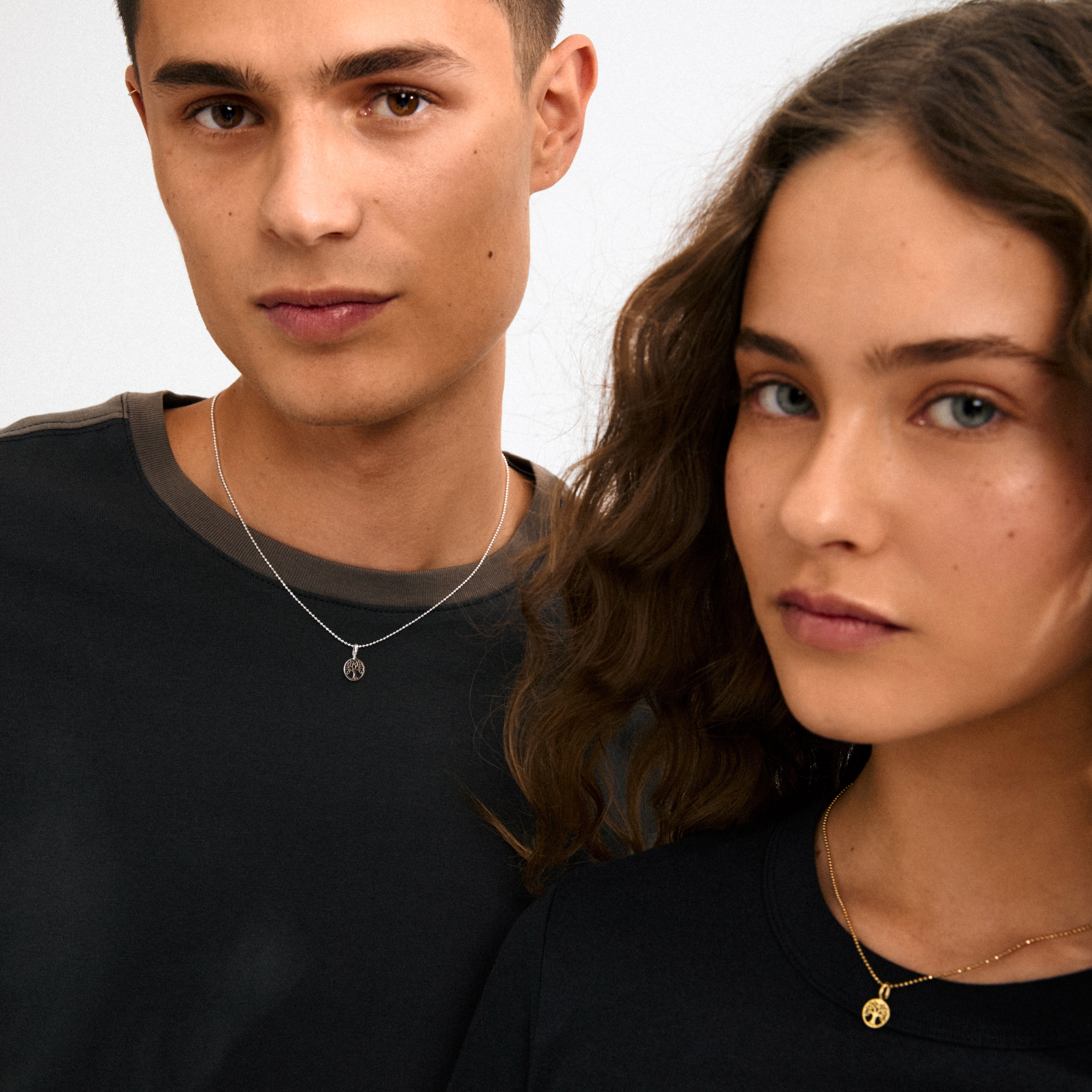 Gold-plated mini Tree of Life charm pendant, symbolizing growth and connection, crafted from 99% recycled materials. Perfect for personalizing necklaces or bracelets with spiritual depth.