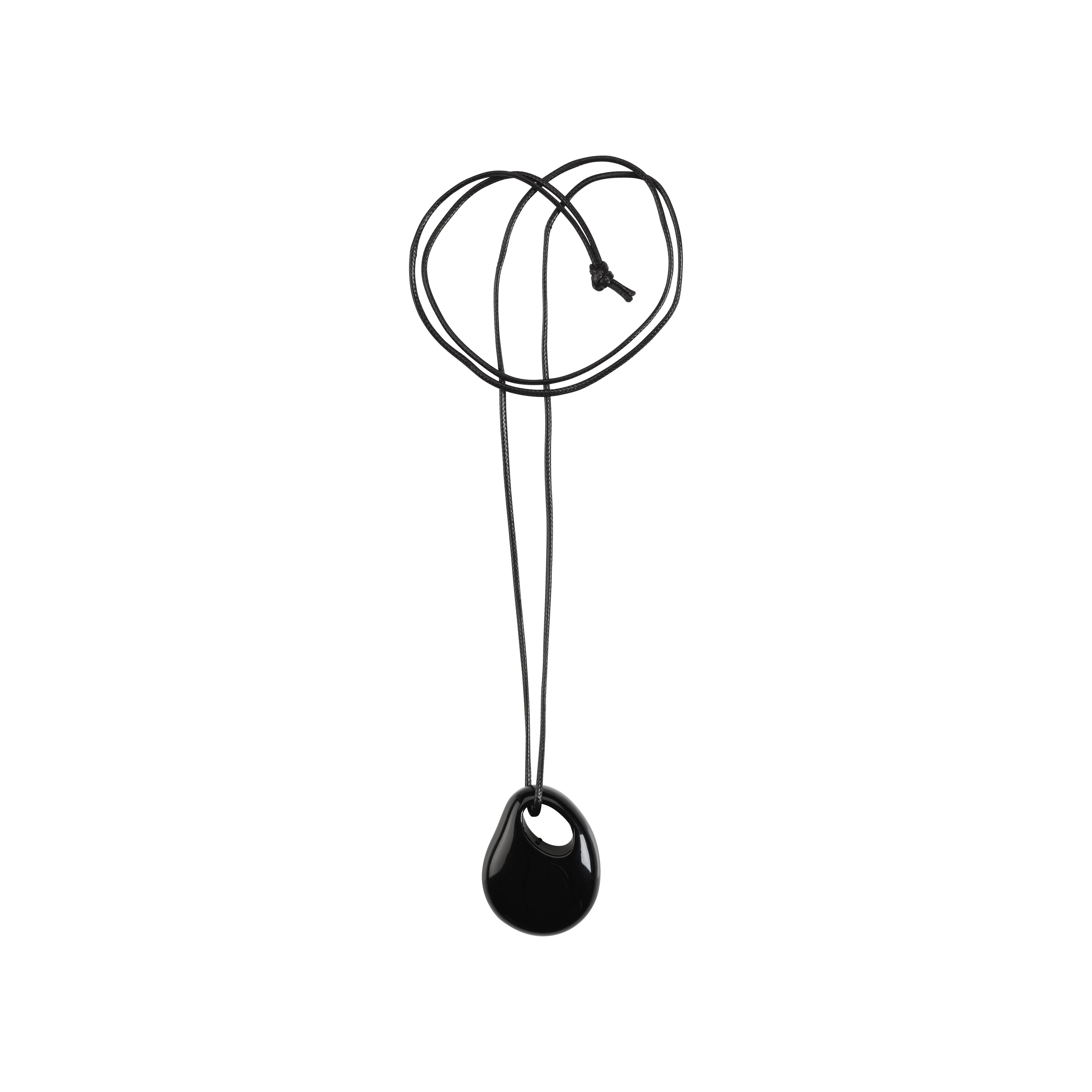 FREJA WEWER x PILGRIM Polpo necklace, black, featuring a large recycled acrylic pendant on an adjustable fabric cord, embodying minimalist style and sustainable fashion.