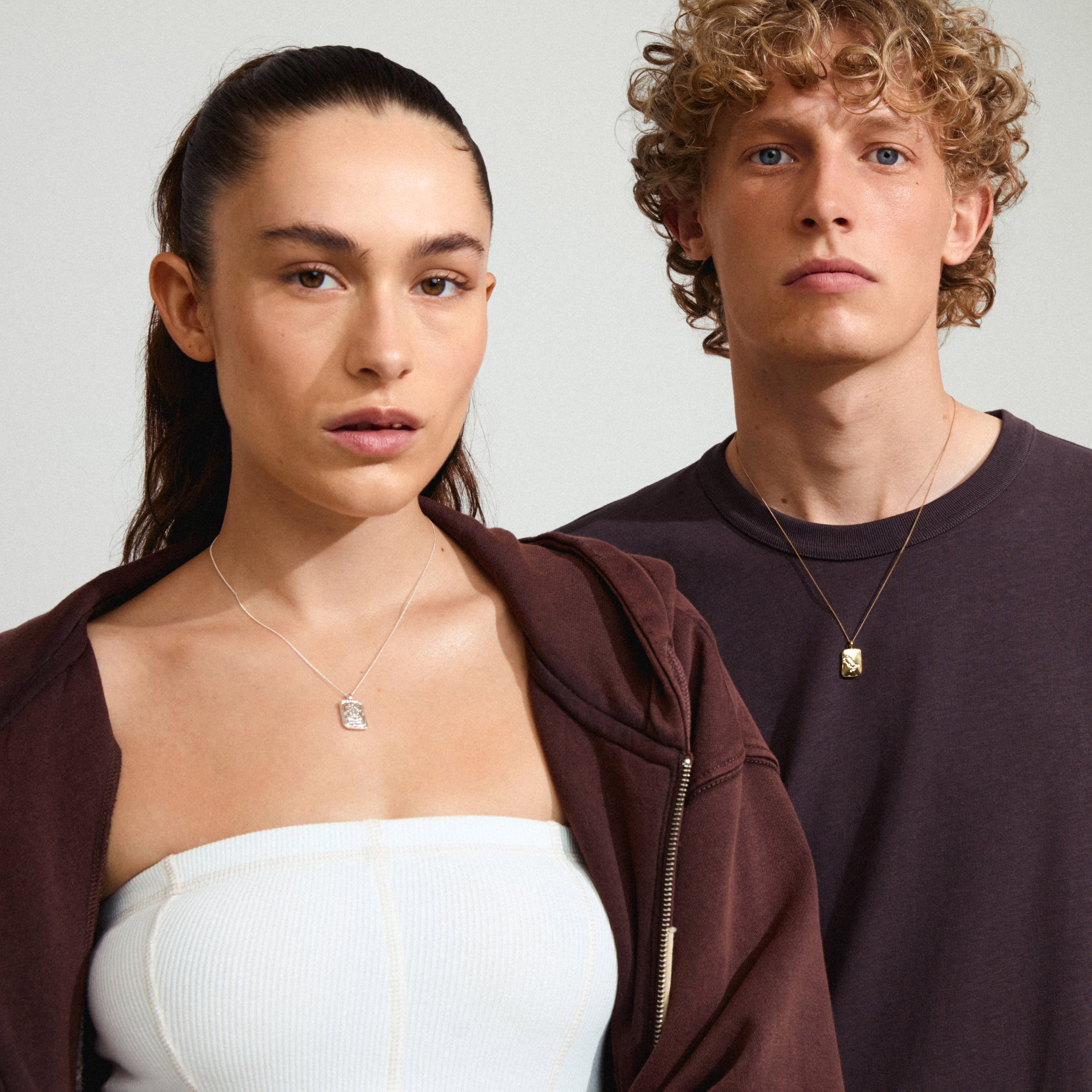 GEMINI Zodiac Sign necklace features a gold-plated, dual-design pendant with a rustic look, showcasing a Gemini motif and constellation with Preciosa crystals.