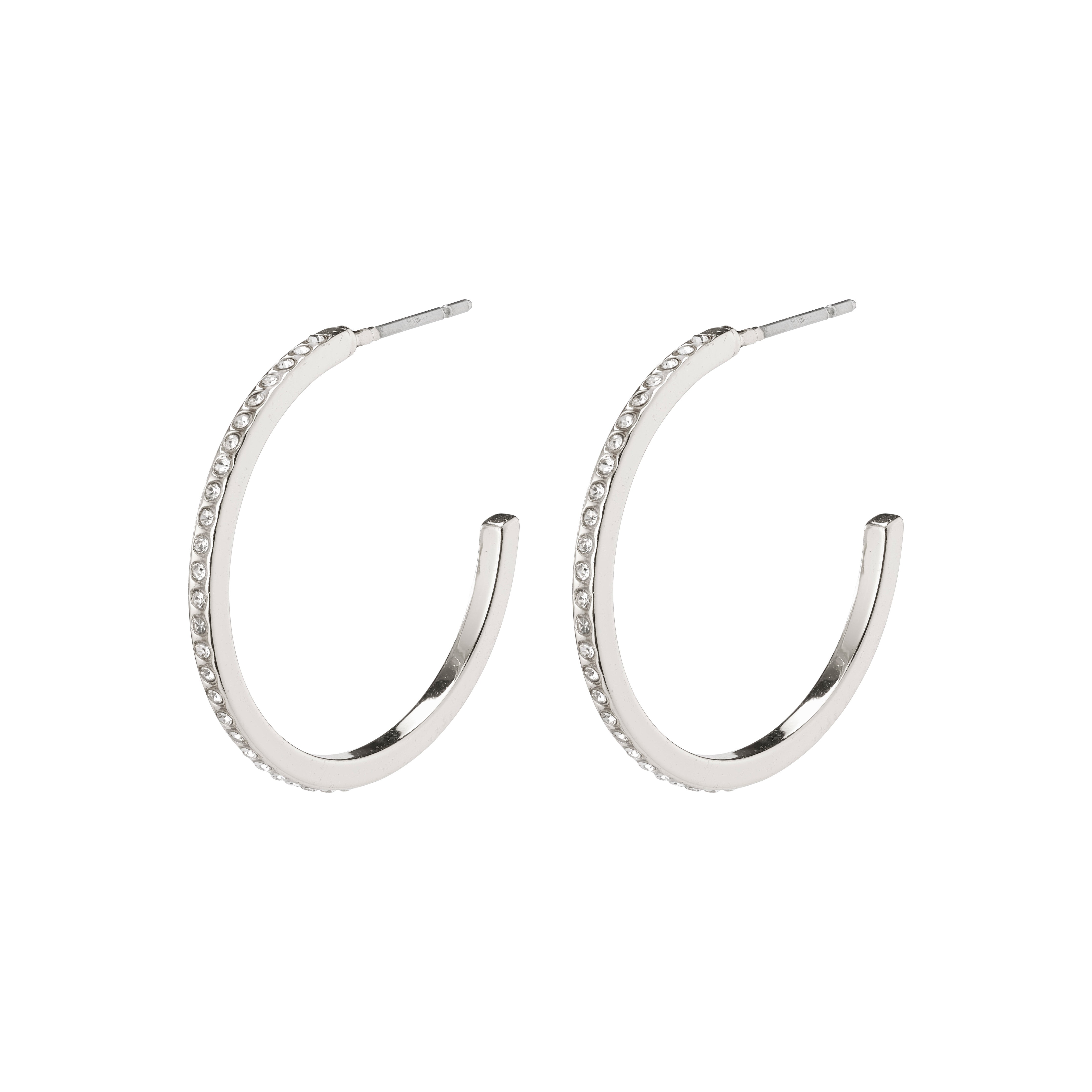 ROBERTA large crystal semi-hoops silver-plated, showcasing elegant crystals for a chic, Nordic-inspired look, ideal for enhancing a casually stylish outfit.