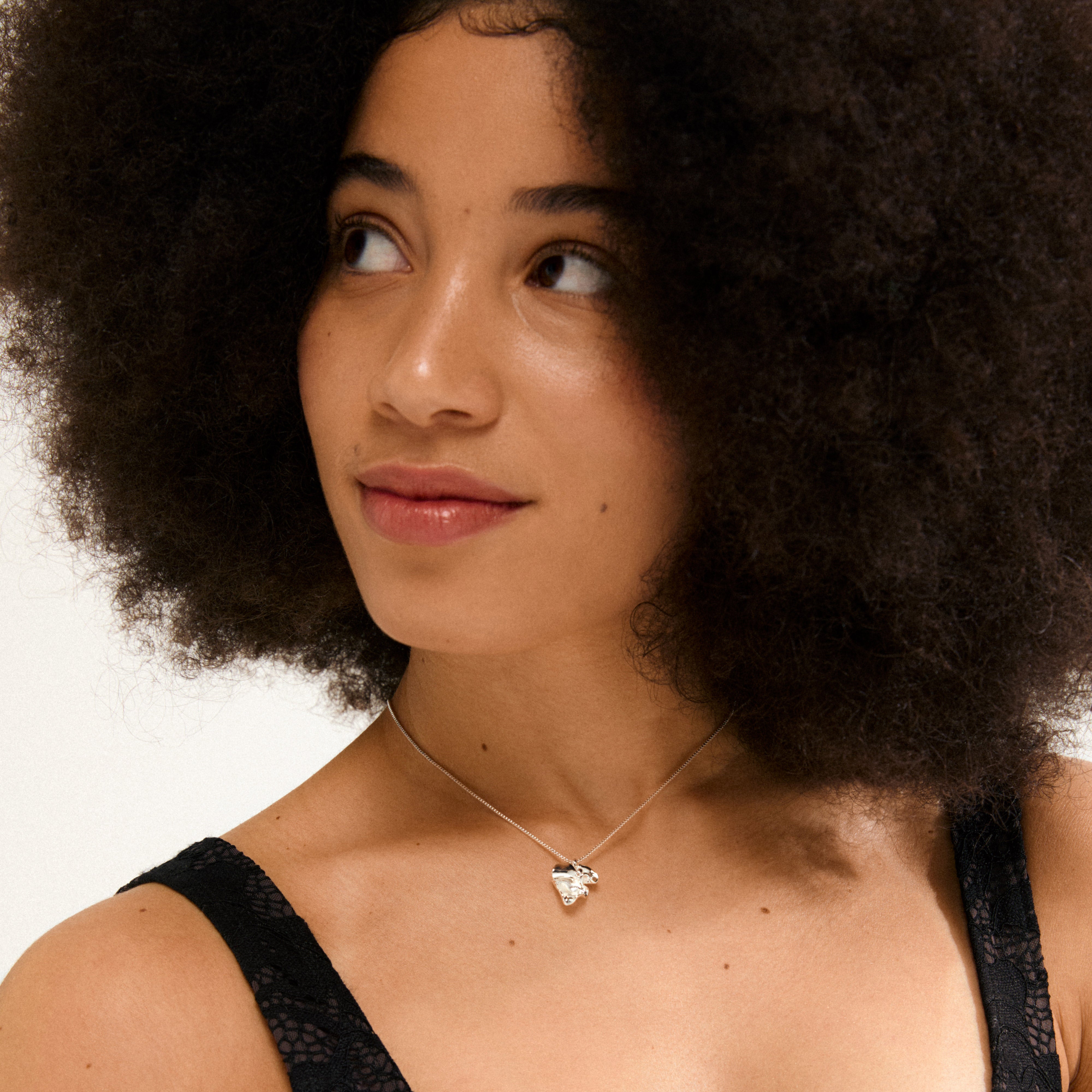 Silver-plated LUIS necklace with abstract flower pendant on a box chain, 38 cm long with a 9 cm extension, ideal for minimalist or layered styles.