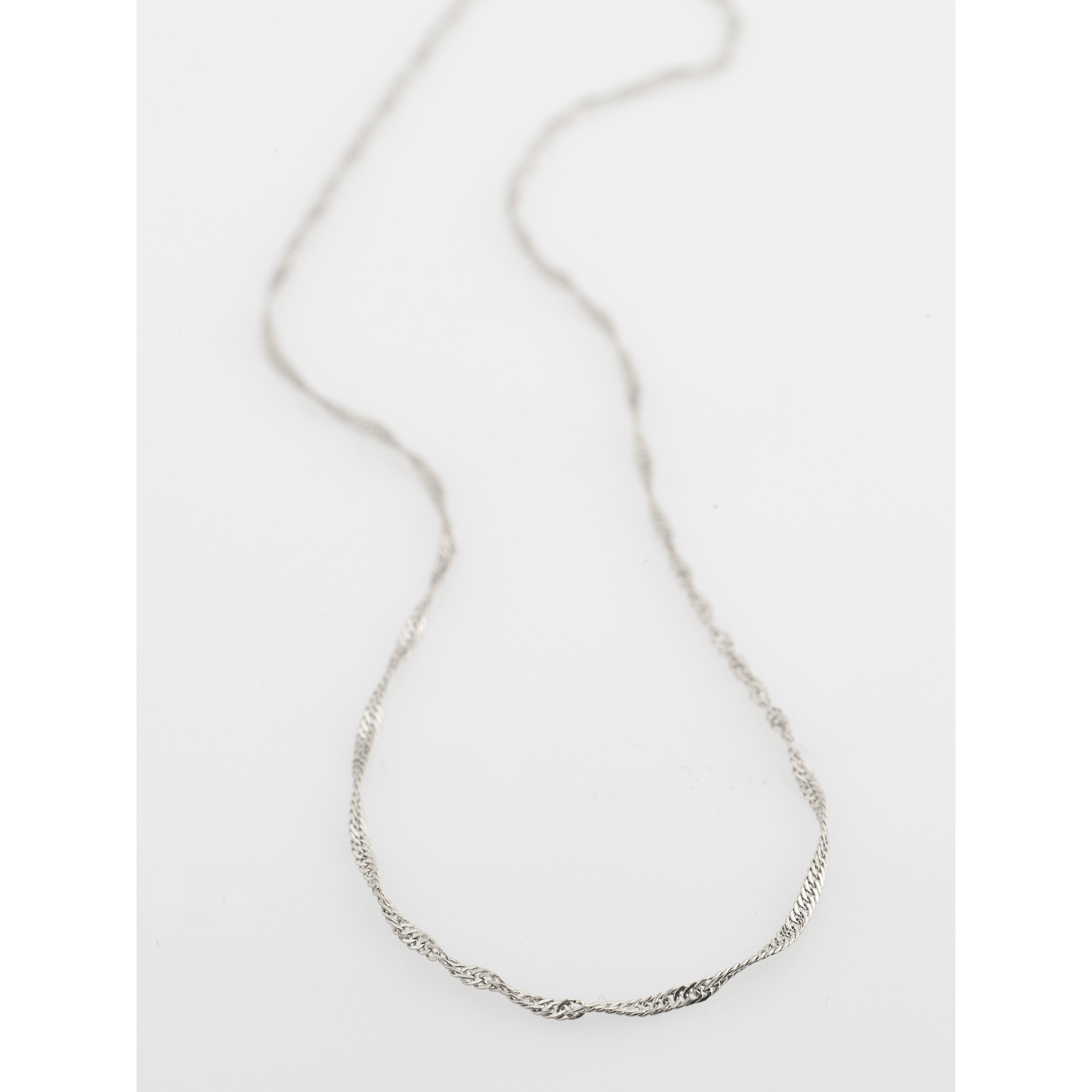 PERI twirl necklace, silver-plated, featuring a minimalist design with a pendant on a delicate chain, perfect for adding a feminine touch to any outfit.