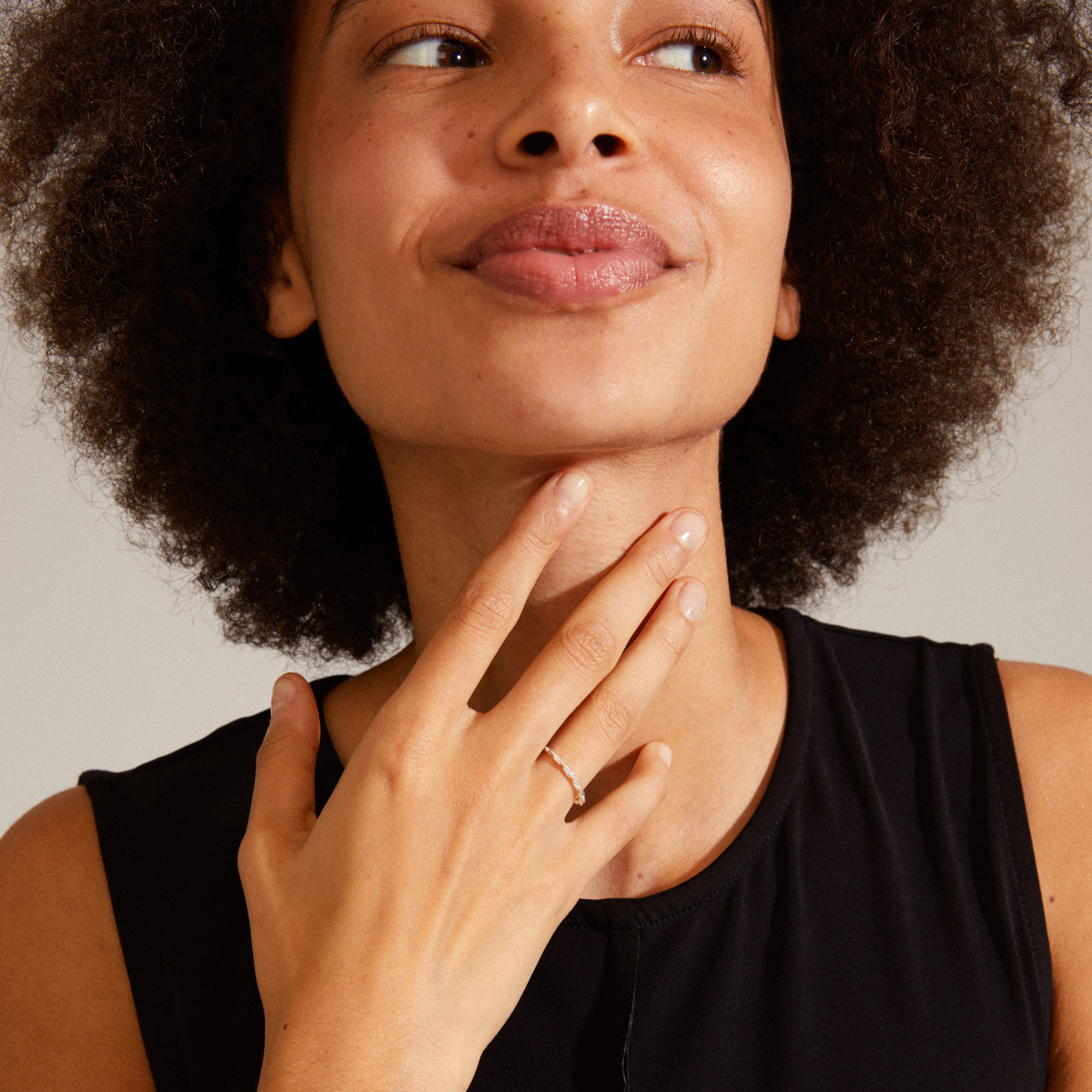 LULU chain stack ring in silver-plated design on a woman's hand, showcasing its industrial-inspired elegance and contemporary style.