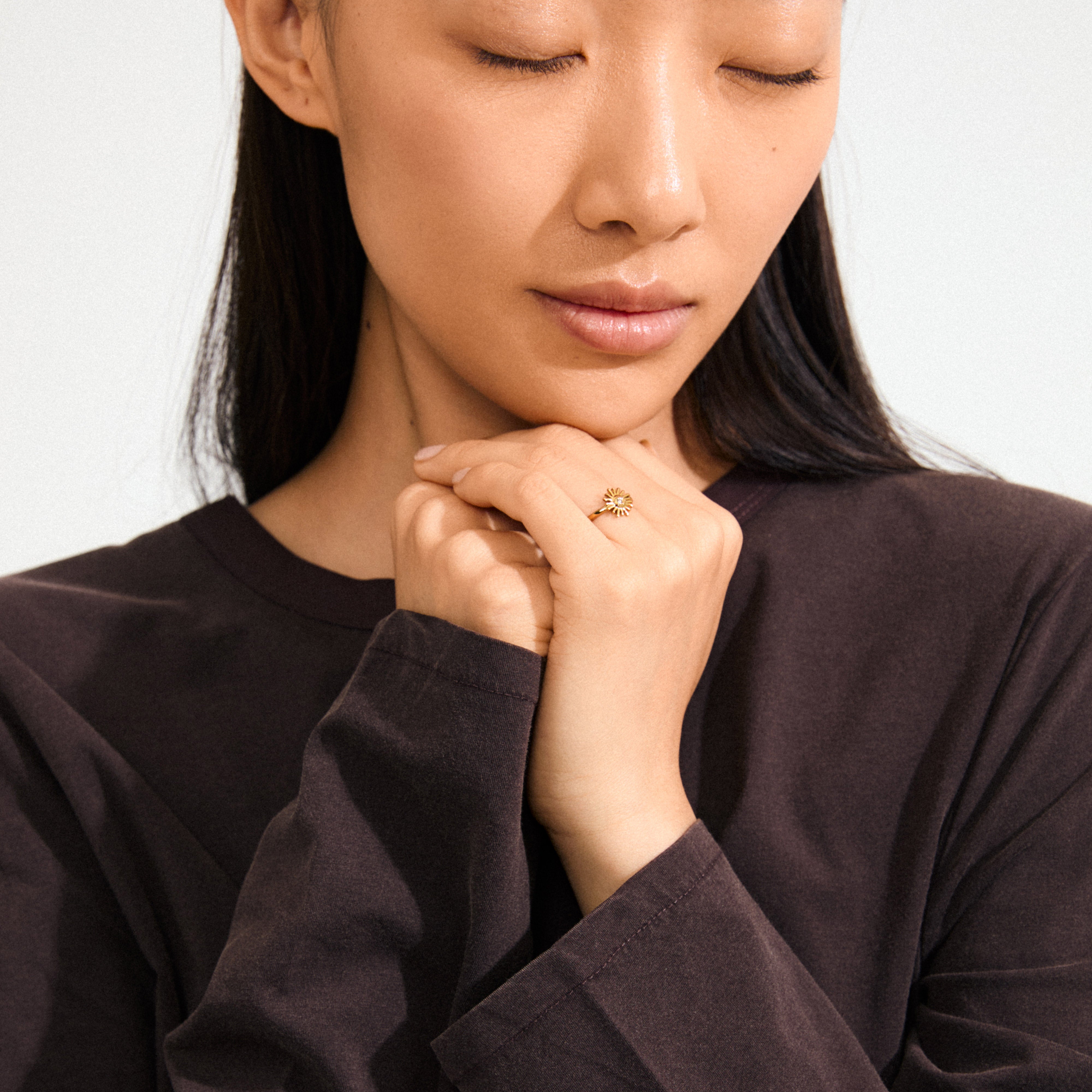 Gold-plated LULU sun stack ring by Pilgrim, featuring a sun design with a central eye and crystal, perfect for a unique, stylish statement.