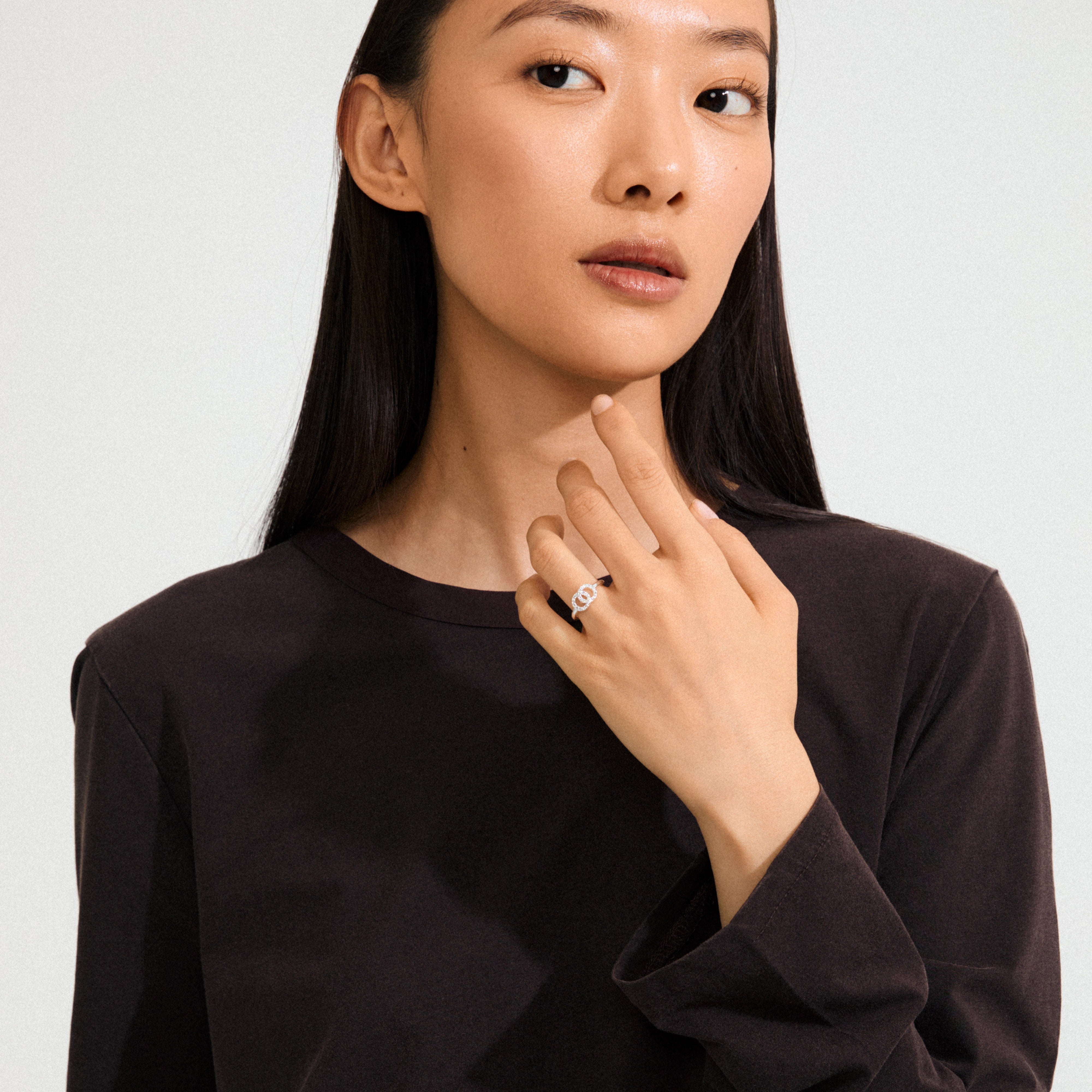 LULU halos stack ring silver-plated with two crystal-adorned circles, symbolizing connection and balance, offering an elegant, sophisticated look. Made from 93% recycled material.