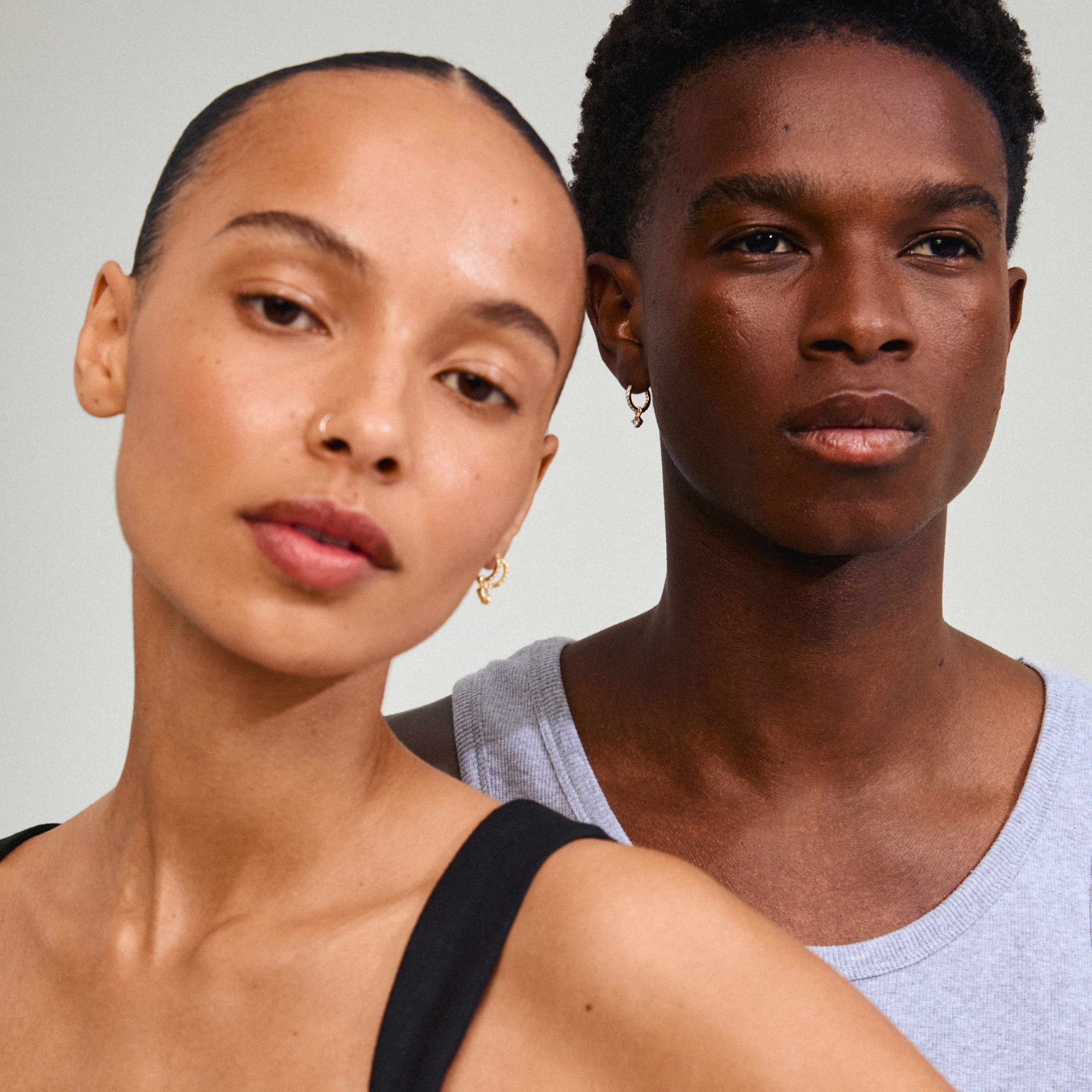 JOA crystal hoop earrings gold-plated, featuring sparkling Preciosa crystals and a dangling pendant, perfect for adding subtle shine to any outfit.