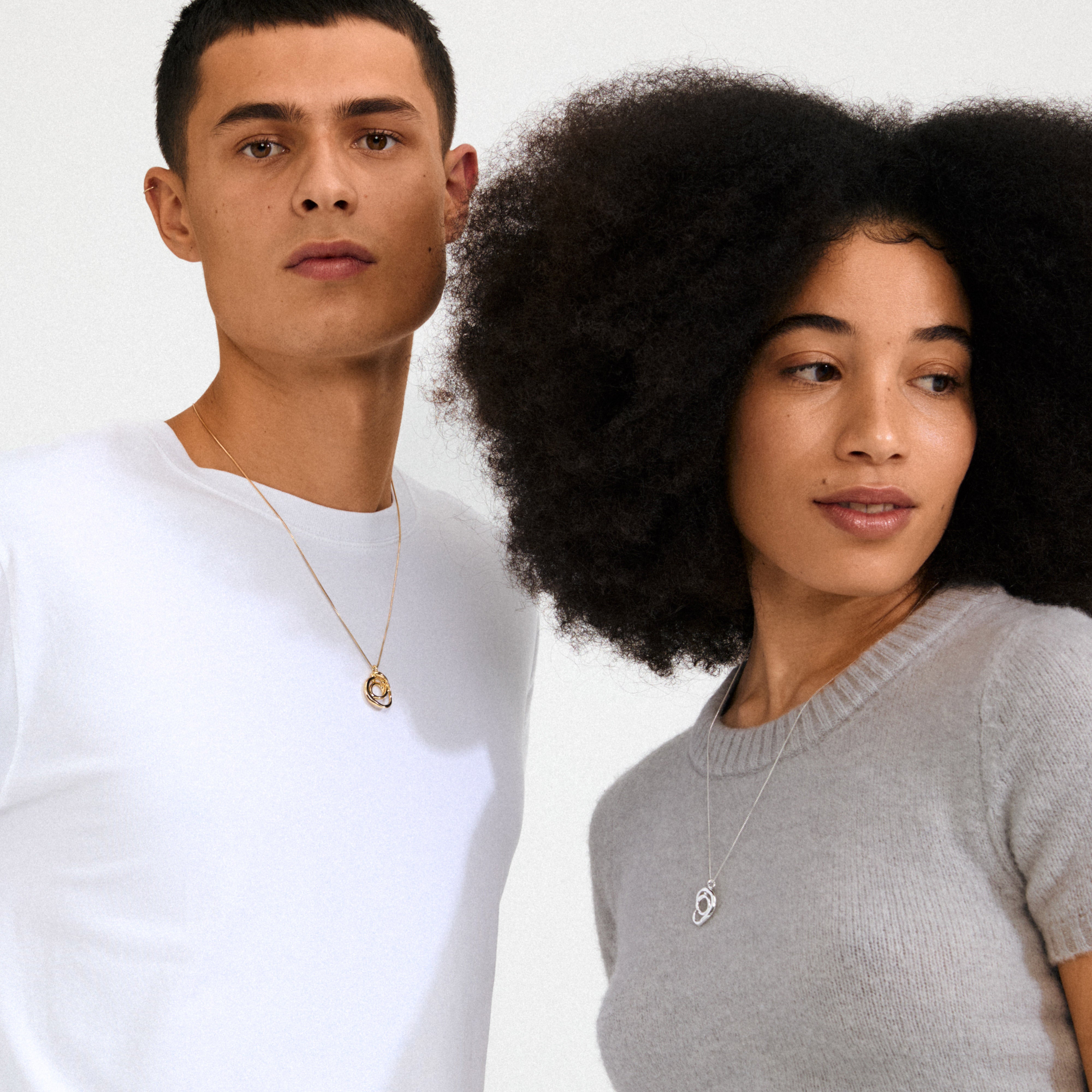 Gold-plated DIEGO necklace from Pilgrim featuring a twisted doodle pendant, adjustable length, crafted from recycled materials for a creative and sustainable style statement.