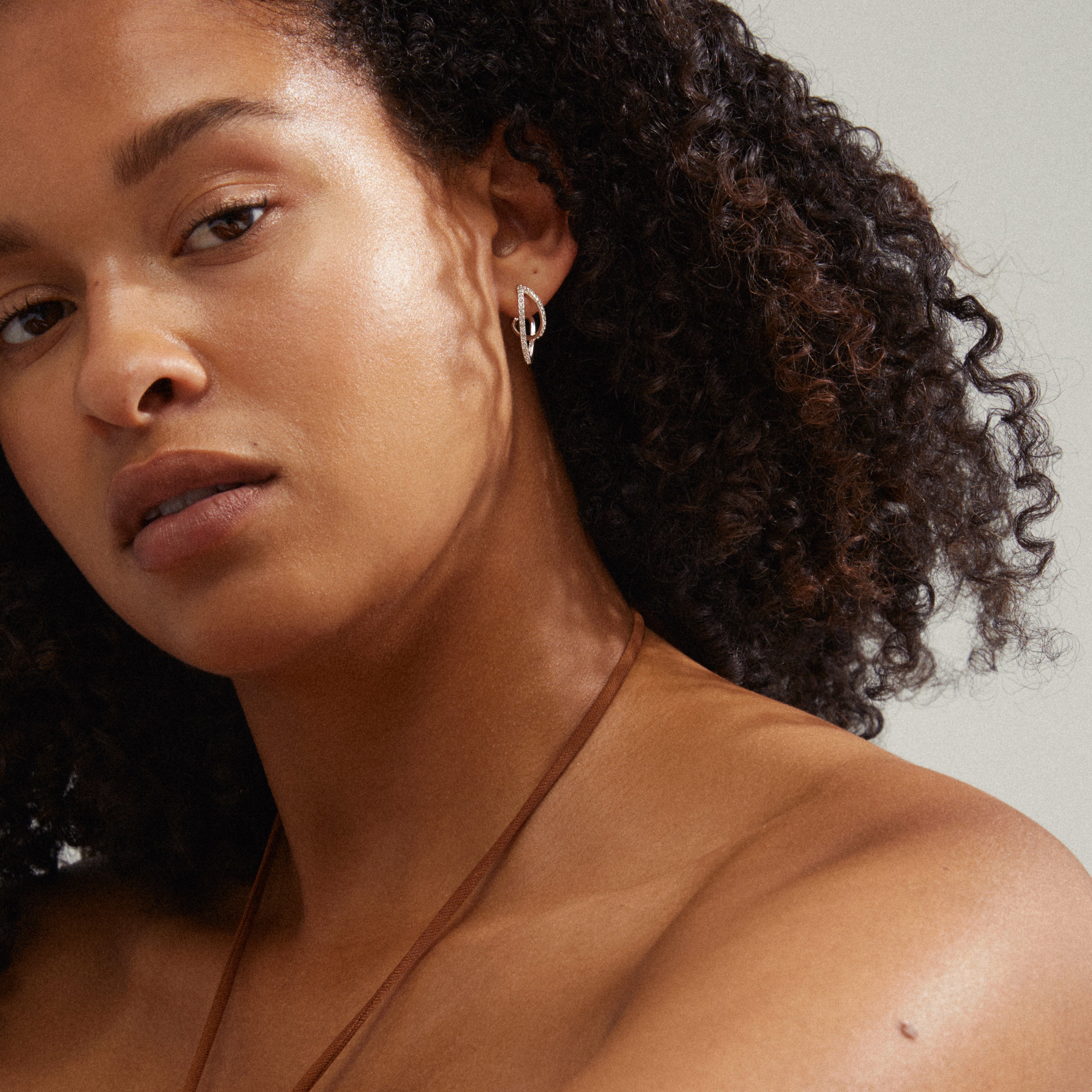 ETTY crystal earrings, silver-plated, featuring elegant hoops with sparkling Preciosa crystals, perfect for adding glamour to any fashionable outfit.