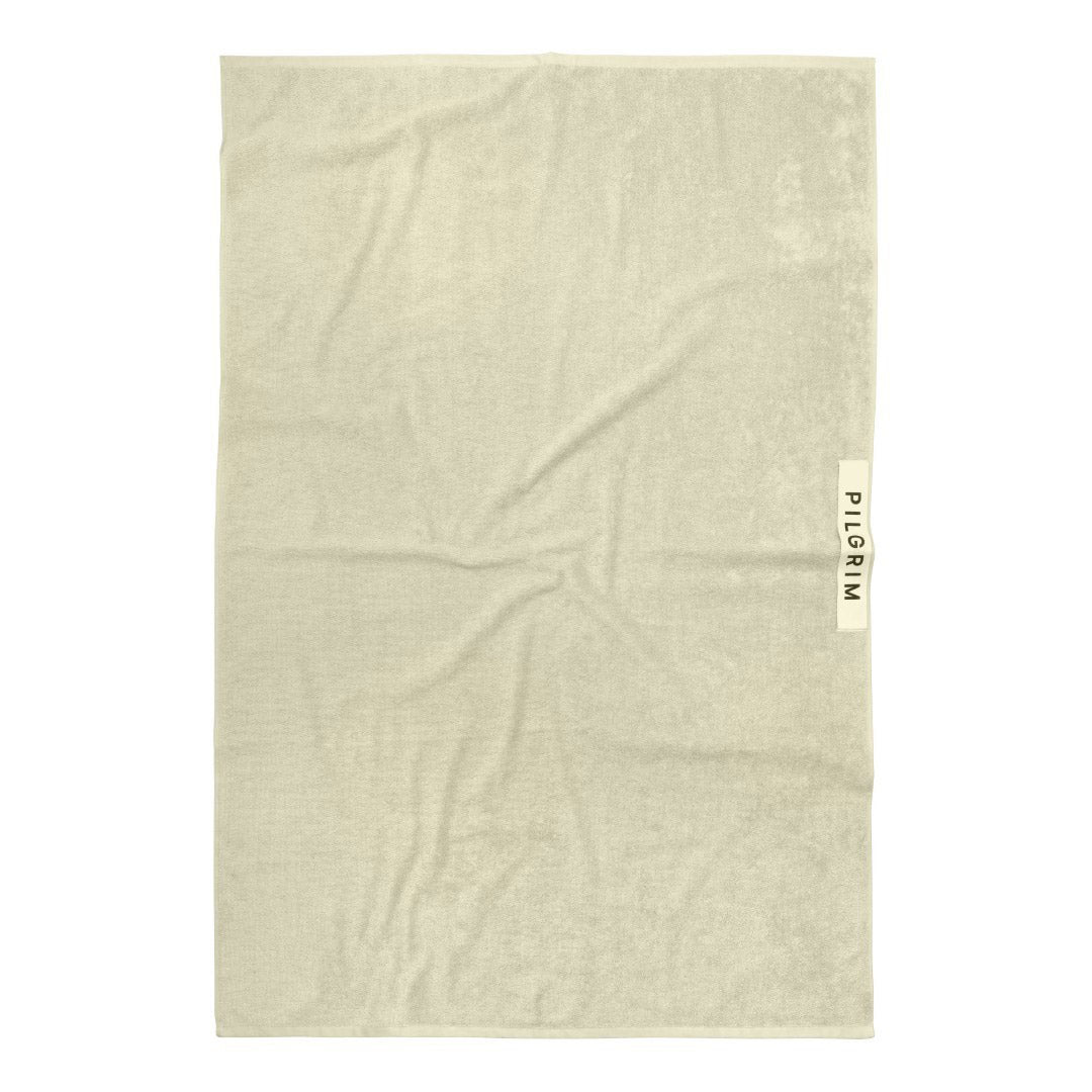 Beach Towel, 100 x 150 cm, features Pilgrim logo on ultra-soft organic cotton, perfect for summer relaxation by the pool or beach.
