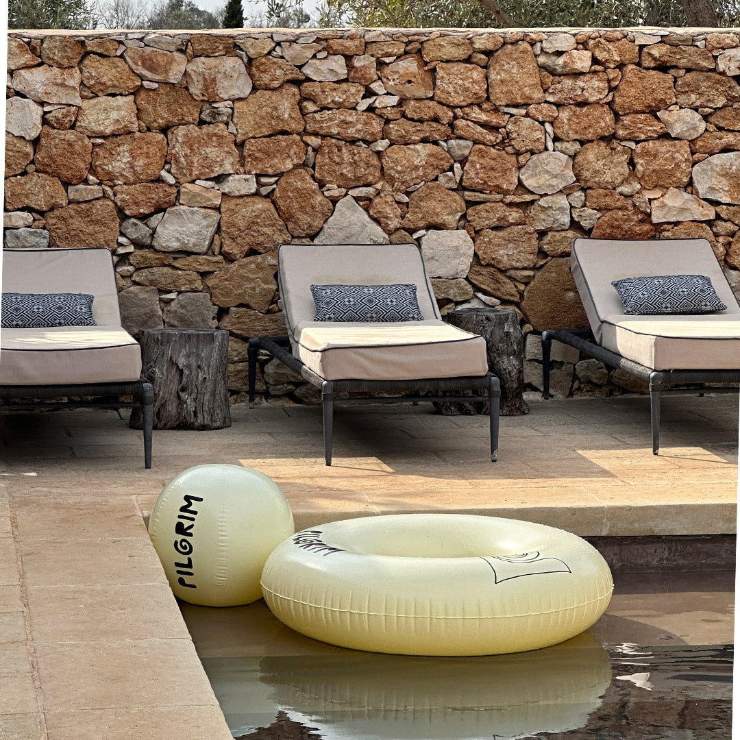 Pilgrim's off-white 50 cm beach ball with a black Pilgrim logo, perfect for summer fun and spreading good vibes.