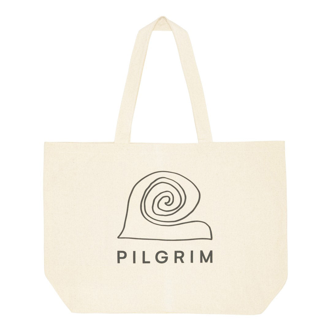 Large Fashion canvas tote-bag in off-white cotton, featuring a bold black spiral logo, perfect for carrying yoga mats or beach essentials.