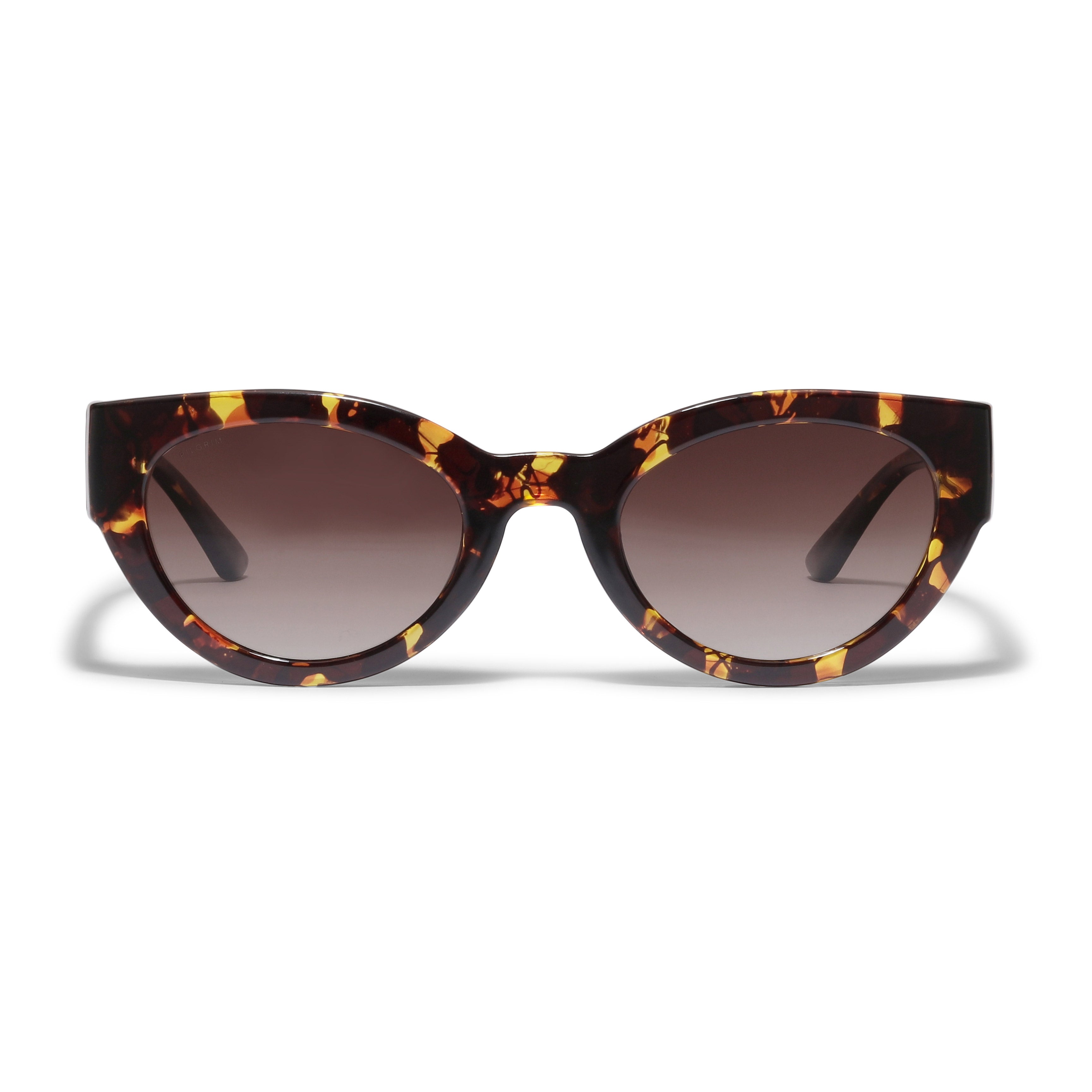 JUNA cat-eye sunglasses in tortoise brown, showcasing a retro-inspired design with a sleek frame and graduated lenses, embodying Pilgrim's blend of timeless and trendy style.
