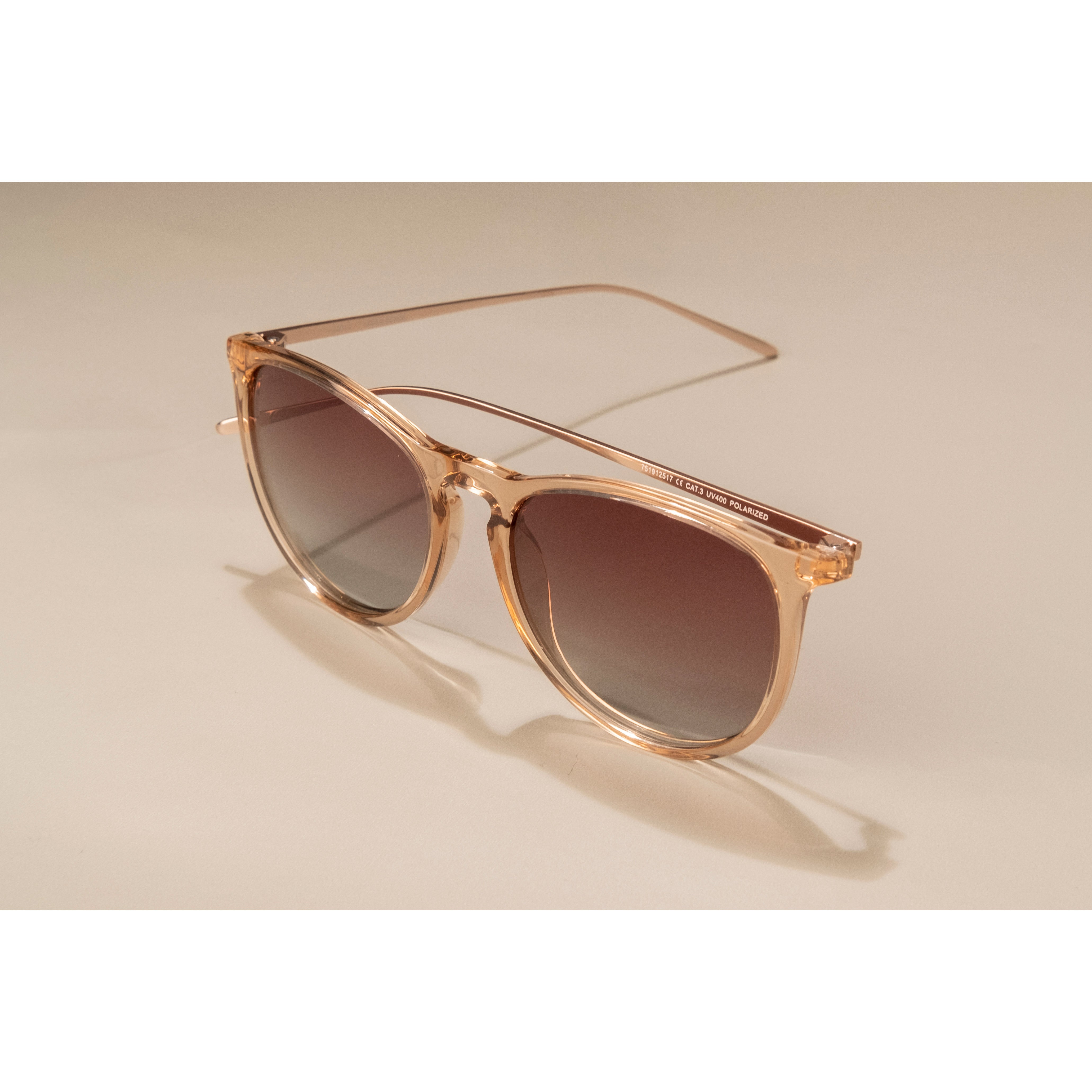 VANILLE sunglasses light brown/gold featuring slender metal temples and soft round lenses, offering a stylish and timeless accessory with UV protection, perfect for summer.