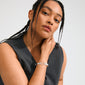 Young person wearing a sleeveless top and Pilgrim's silver-plated FREE bangle with an open-oval design, showcasing minimalist Scandinavian flair and trendy style.