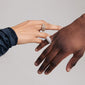 Close-up of a hand wearing Pilgrim's silver-plated FOCUS crystal ring with a chunky design and shimmering Preciosa crystals, showcasing elegant craftsmanship.