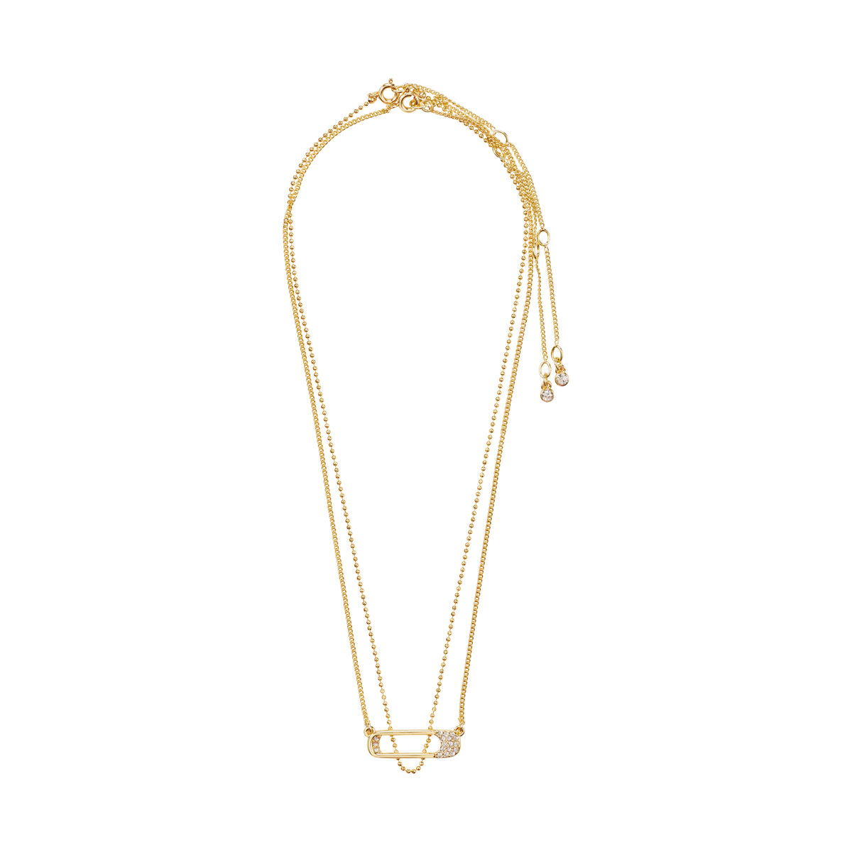 Gold-plated INSTANT necklace set featuring two slim layered chains with a safety pin-inspired pendant adorned with Preciosa crystals. Includes adjustable chain tails with crystal beads.
