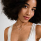 Young person wearing Pilgrim's INSTANT necklace, 2-in-1 set, featuring layered silver chains with a crystal-embellished rectangular pendant, styled for an urban, edgy look.