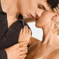 Close-up of a couple wearing Pilgrim's SPARKLE gold-plated ring, showcasing its unique, sculptural design and adjustable fit, emphasizing tactile connection and modern style.