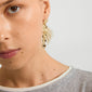 Close-up of SPARKLE earrings gold-plated by Pilgrim, featuring linked, irregular discs on a dangling chain, adding a vintage sparkle to the look.