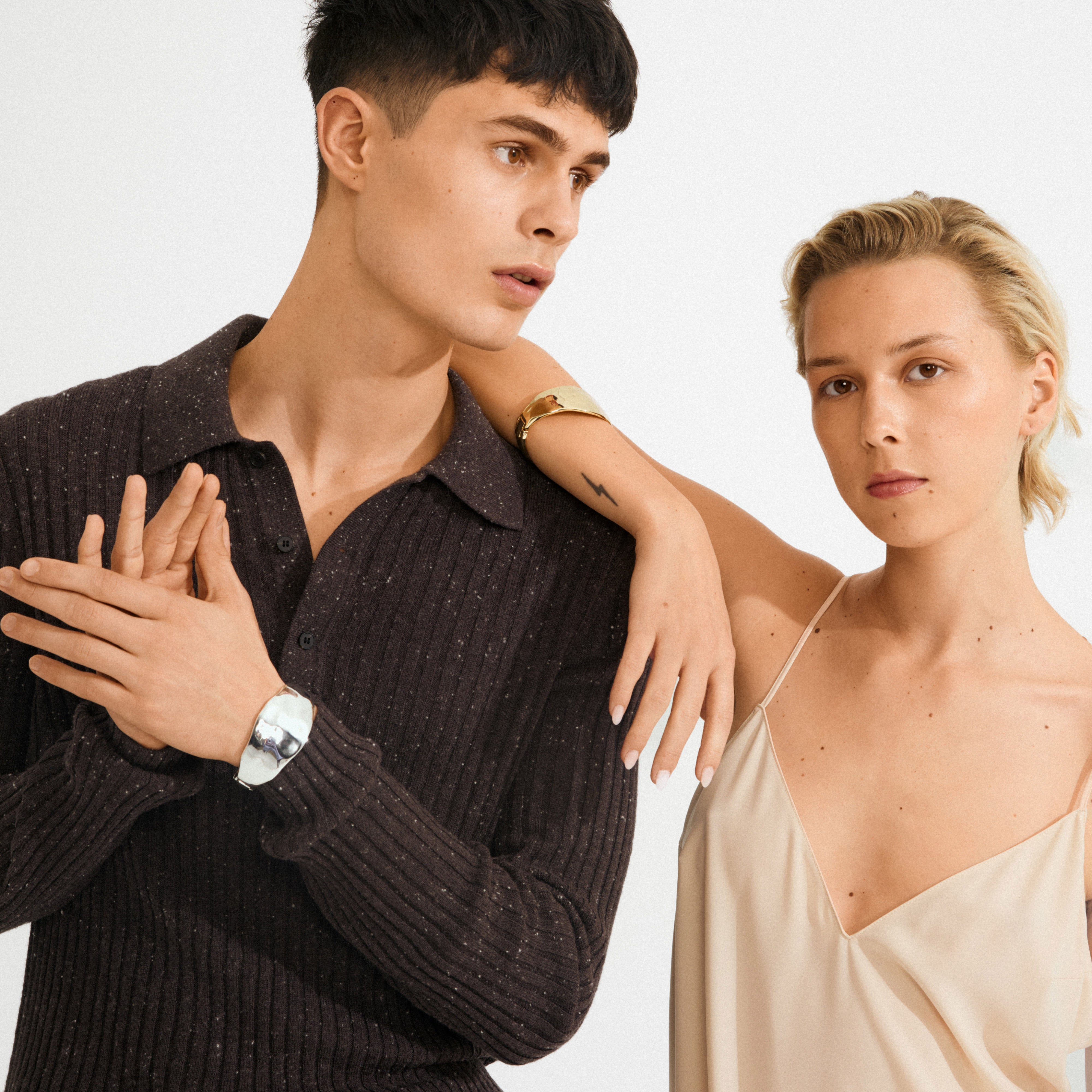 Models showcase the SPARKLE bracelet silver-plated by Pilgrim, highlighting its minimalist Nordic design and handcrafted feel. Perfect for a stylish, eco-friendly statement.