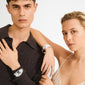 Two models wearing Pilgrim's SPARKLE bracelet, showcasing the silver-plated, sculptural design with a sleek, minimalist Nordic vibe.