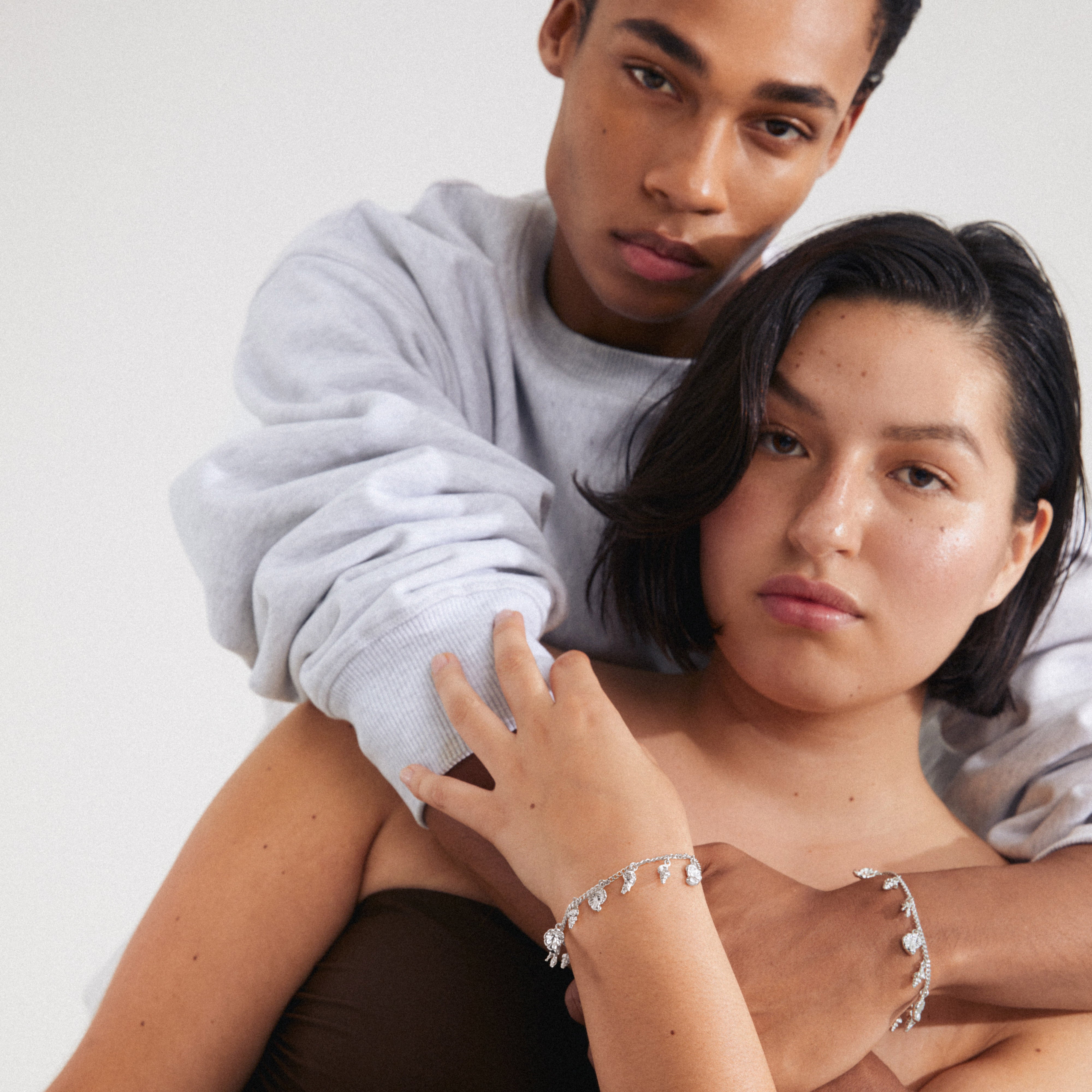 SEA bracelet silver-plated with tiny sea-inspired pendants, worn by a woman. Part of Pilgrim's Shapes Of Life collection, exuding beachy summer vibes.