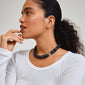 ECLIPSE necklace grey/gold-plated on woman’s neck, featuring chunky recycled acrylic beads with gold-plated extension, embodying Pilgrim’s effortless and versatile style.