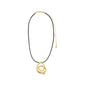 UNFOLD necklace gold-plated featuring a black leather cord and a unique, artistic gold pendant of interlocking rings, embodying Pilgrim's creative and sustainable style.