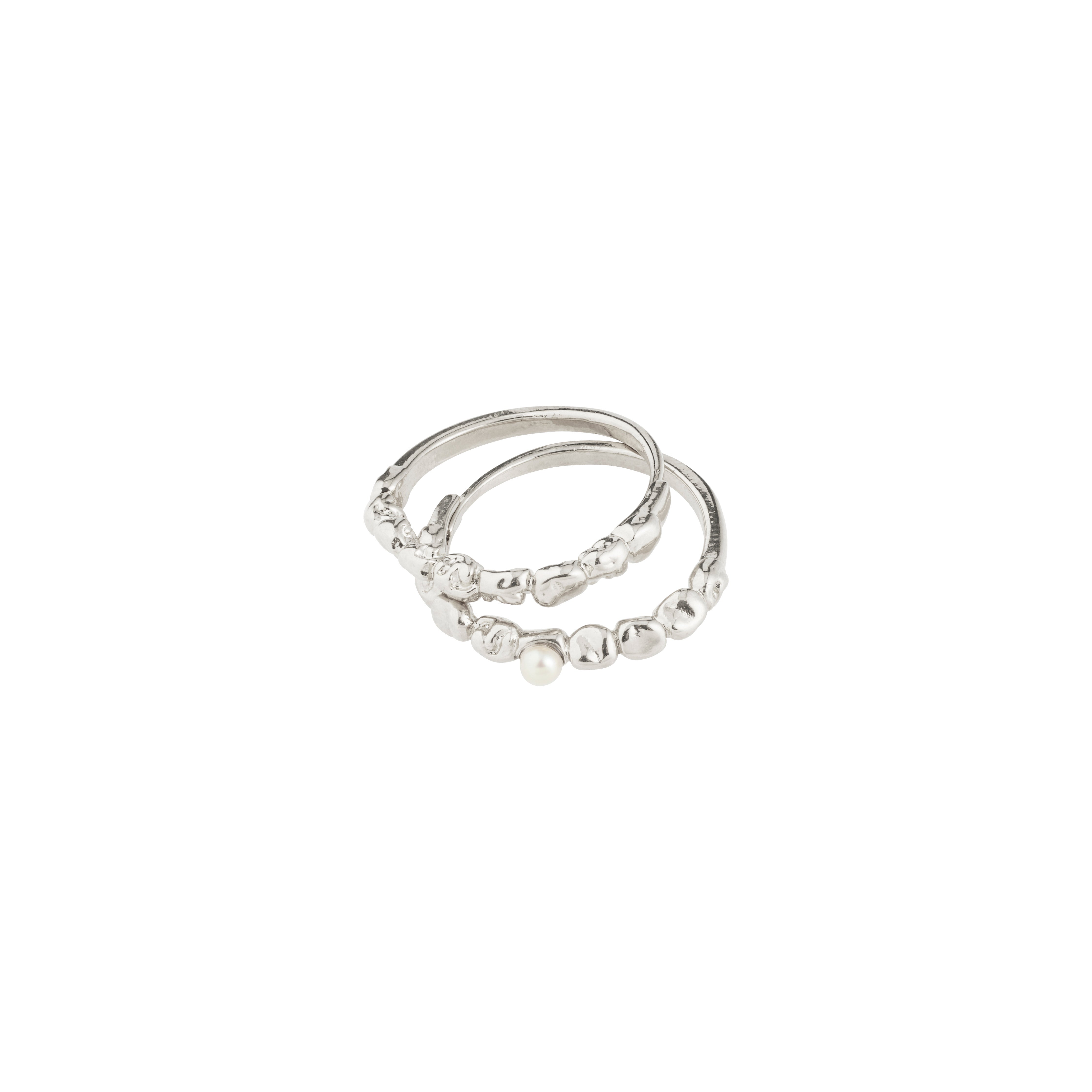 Silver-plated SHIFT ring set with pebble texture, featuring an organic design; one ring includes a small white pearl, perfect for a romantic stacked look.