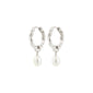 Silver-plated SHIFT pearl earrings with textured hoops and removable freshwater pearl pendants, featuring easy snap locks for versatile styling.